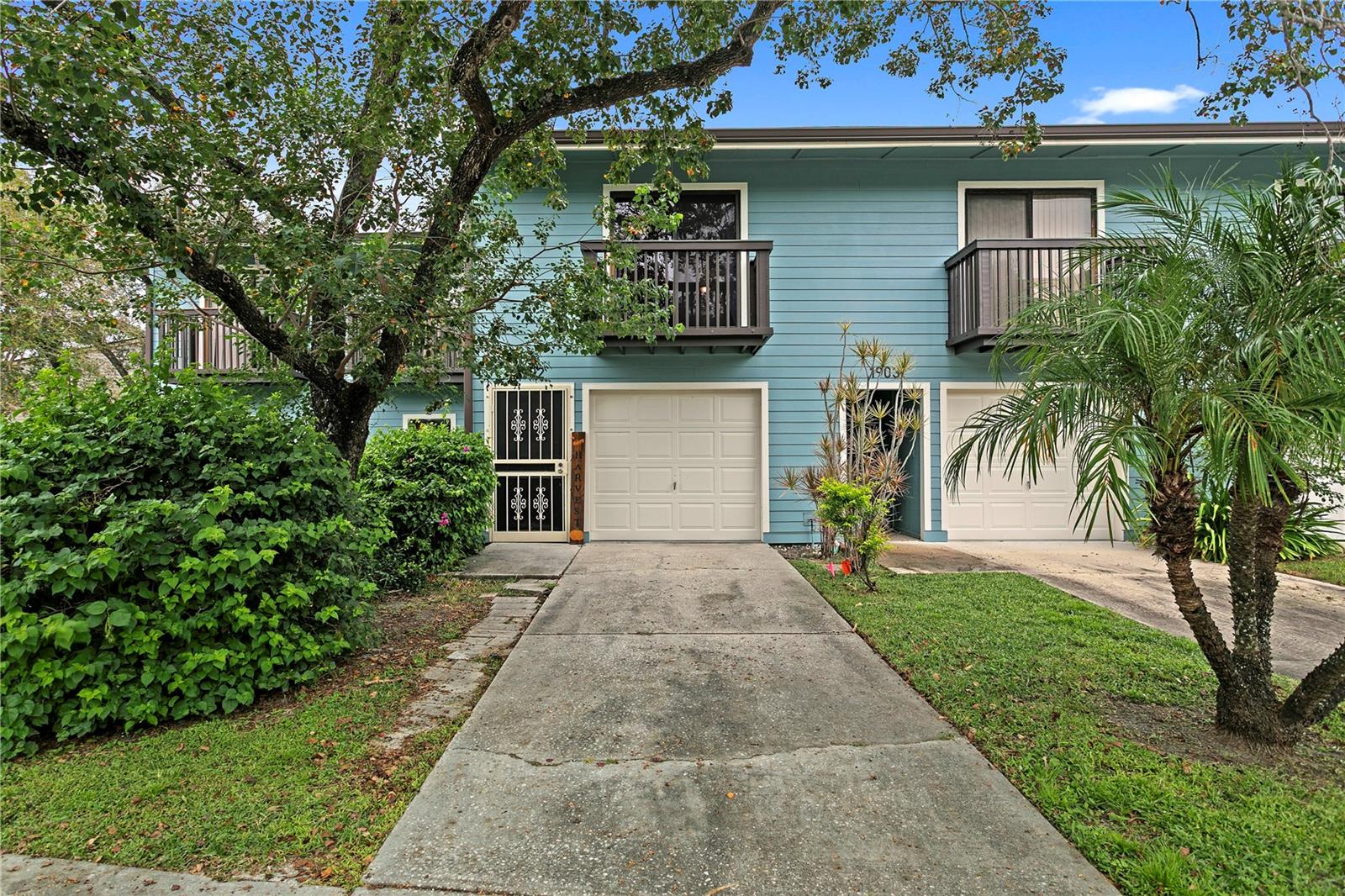 Lake Forest – Trilevel Living with Serene Lake Views in Pinellas Park: Discover the charm of Lake Forest, a unique trilevel residence community in Pinellas Park offering a blend of comfortable living, natural beauty, and resort-style amenities. This 2-bedroom, 2-bath residence features a thoughtfully designed layout with a private ground-floor entrance and an attached one-car garage. The first floor offers a spacious indoor laundry and utility room for added convenience. The second floor features an open-concept kitchen and living area, creating an inviting space for relaxing or entertaining. On the third floor, you'll find two bedrooms and two full bathrooms. The primary bedroom offers a private balcony, while the screened-in back porch provides a peaceful spot to enjoy beautiful views of the community lake. Lake Forest offers a lifestyle surrounded by nature, with a scenic lake, nature trail, community swimming pool and spa, and clubhouse. Nearby open green spaces and an equestrian setting add to the area's natural appeal. Just across from the community entrance, Helen S. Howarth Park and Forbes Community Recreation Center offer a variety of outdoor activities, including a dog park, baseball fields, and pickleball courts. Enjoy the best of Florida living with Gulf Coast beaches just a short drive away, perfect for relaxing beach days, spectacular sunsets, and coastal adventures. Downtown is approximately a 30-minute drive away, providing convenient access to dining, shopping, entertainment, and more. Located in a non-flood zone, this residence offers additional peace of mind. Monthly HOA dues cover water, cable, sewer, trash, exterior building maintenance, and grounds maintenance. The Lake Forest community is undergoing an exterior painting refresh, and this building has already been completed. Enjoy the combination of distinctive trilevel living, peaceful lake views, community amenities, and convenient access to parks, Gulf Coast beaches, and local attractions in this inviting Lake Forest residence.