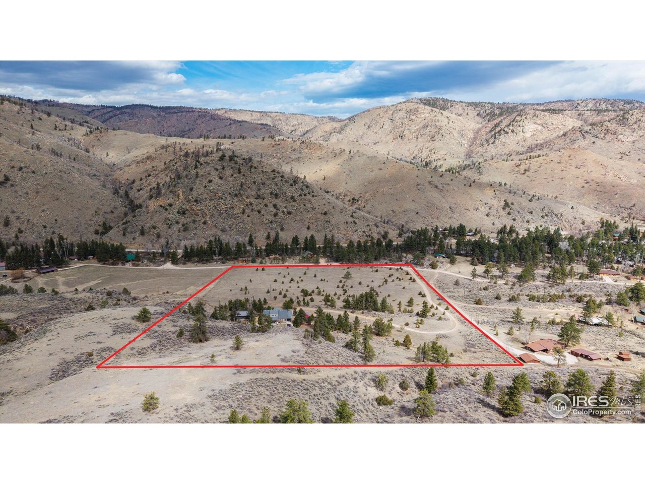 This welcoming home blends everyday comfort with rustic charm and endless adventures. The main level offers a cozy living room with wood floors and generous windows that frame sweeping mountain views. The primary suite is a true retreat, with a walk-in closet, private bath, and radiant floors for comfort during those chilly mornings. Upstairs, two additional bedrooms and a spacious family room offer flexible space for relaxing, working from home, crafts, workout space, or office. The walk-out basement adds a quiet bedroom with peaceful views, along with a large storage and utility area. Step outside and embrace your own private escape-unwind in the hot tub beneath Milky Way skies, share stories around the gas fire pit, or simply soak in the calm of your surroundings. An oversized garage offers room for parking, shop space, or hobbies, while the 962 sq ft heated and insulated shop with 10-foot door is ideal for larger vehicles, equipment, projects, and toys. Horses will enjoy grazing in the lush meadow, supported by a 1/10th interest in Fry & Haskins Ditch water rights. Backing to National Forest, the property is a haven for wildlife, including deer, moose, bear, and a wide variety of colorful birds. Just along the main road, the Cache La Poudre Canyon delivers world-class fishing, while nearby Mishawaka hosts live summer music under the stars while dining. Watch rafters drift by, or be inspired to join them. Red Feather Lakes, only 25 minutes away. In either area you will find recreational opportunities, from skiing and hunting, to hiking, kayaking, cross-country skiing, and snowshoeing, or plein-air painting and photography. Ft Collins only an hour away, Steamboat Springs about an 1-1/2 hours away. This true Colorado Lifestyle property offers comfort, convenience, and year-round outdoor enjoyment. Note that websites showing insurance pricing are not represented by the owner or this broker; buyers should contact their own insurance providers for local information.