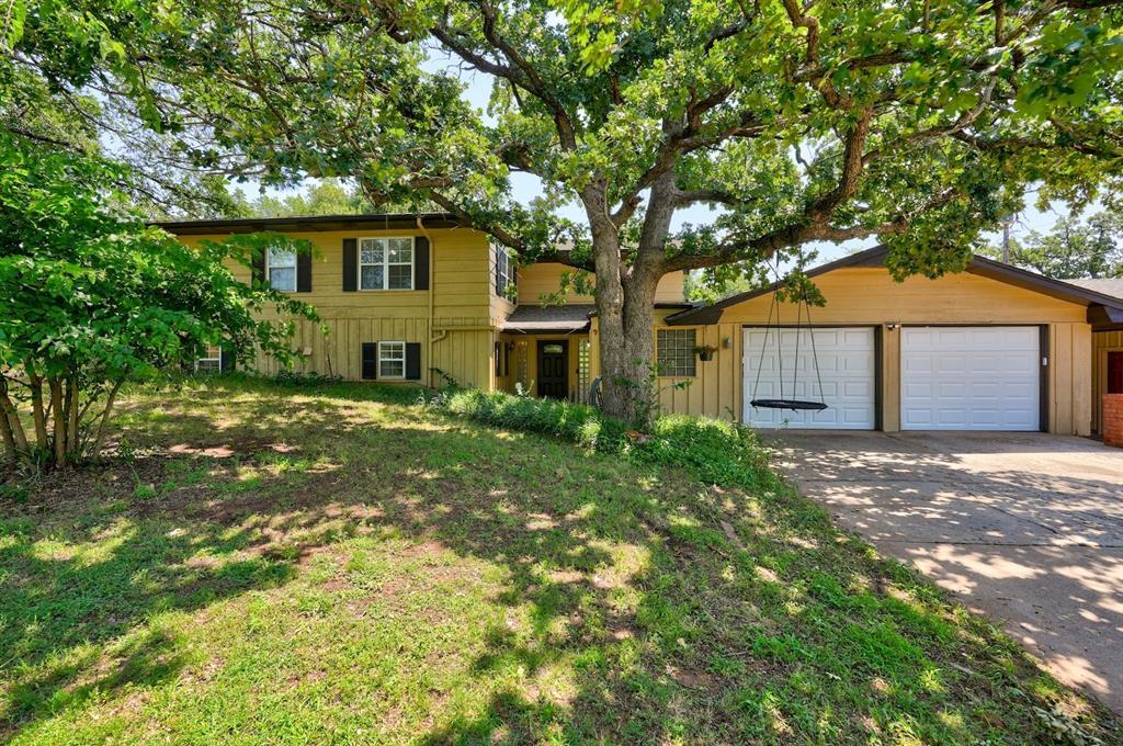 Great home on 2.5 Acres in town Edmond Schools! Country living but close to shopping/restaurants/grocery, hop on I-35 which isn't far as well. 3 bed 2.5 bath 2 car in main house with other living quarters/garage apt having 1 bed and 1 bath or used for storage and additional 640sf not included in listed sq ft. Certain animals ok to have out here if you want. Partially built in ground helping with utilities. Pool is in process of being cleaned and opened for the summer. Recent updates include paint, partially remodeled baths, some flooring, kitchen island countertop, some light fixtures, new dishwasher & cooktop & newer water heater. Sellers also installed water purification and softener system on well. Woodburning fireplace with blower is nice in the winter! Lots of possibilities here.