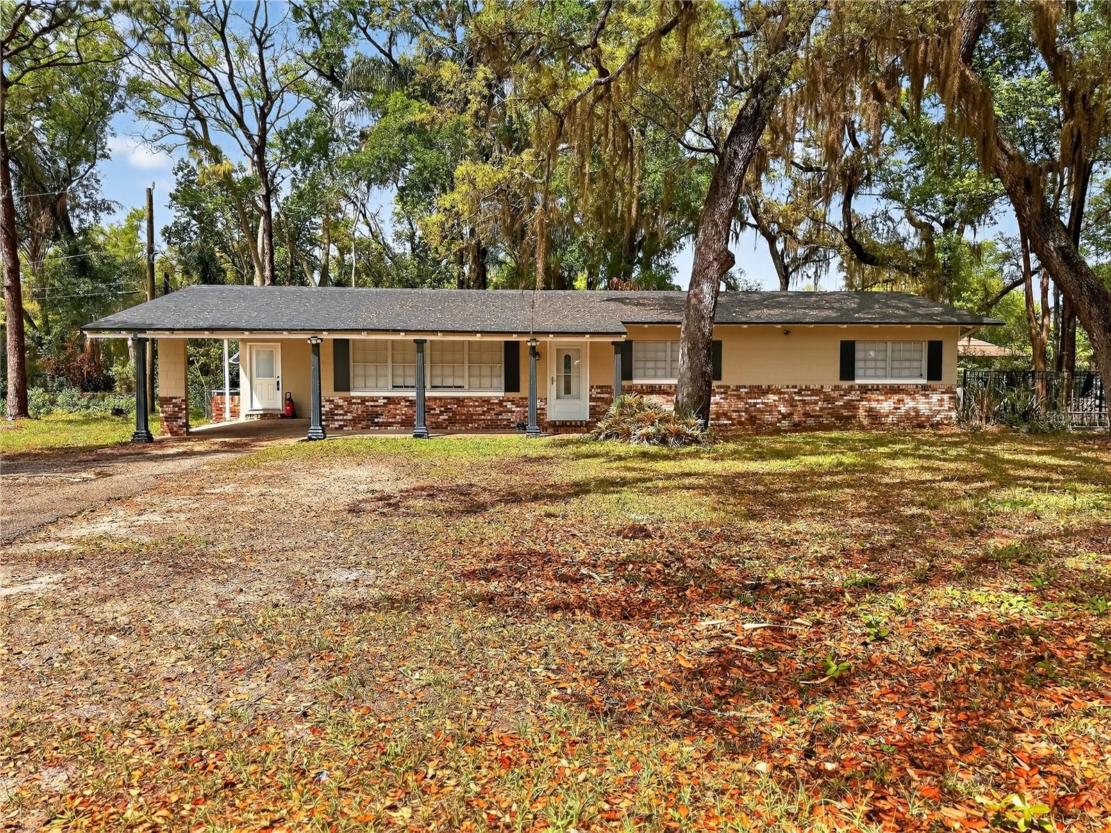PRICE REDUCTION  SELLER MOTIVATED! PRICED TO SELL & READY FOR QUICK MOVE-IN! Welcome to this charming 3-bedroom, 2-bath home offering the perfect blend of modern updates and classic comfort, nestled on a quiet, tree-lined street in the heart of Lake Mary with NO HOA.Enjoy peace of mind with a roof just 3 years old, terminated bond, and two new energy efficient double pane windows, plus an upgraded sliding glass door that brings in natural light and easy backyard access.Inside, you'll find luxury wood look plank tile flooring throughout the main living areas and carpet in the bedrooms. The spacious kitchen features beautiful granite countertops, 36” wood cabinetry, and stainless steel appliances, making it ideal for both everyday living and entertaining.The home offers a welcoming dining/living area perfect for gatherings, along with a separate cozy family room that provides a relaxing retreat.Step outside to enjoy your fully fenced backyard situated on nearly half an acre (.47 acres). The property also features a newly upgraded septic tank system for added reliability.Additional highlights include durable concrete block construction and a HVAC system installed in 2016. Prime Location: Just minutes from Lake Mary’s top-rated schools, shopping, dining, SunRail, the Lake Mary Events Center, new pickleball courts, and the vibrant 4th Street entertainment district.Don’t miss this incredible opportunity schedule your private showing today!