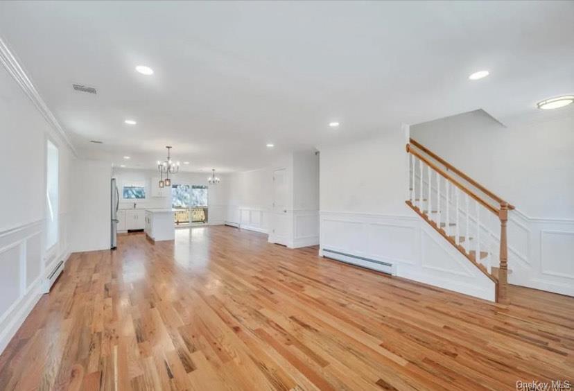 Welcome to 490 William Floyd Parkway, a stunning brand-new construction home in Shirley, set back over 100 feet from the road. This beautifully designed 4-bedroom, 2-bath residence combines modern style with exceptional energy efficiency, offering comfort and savings for years to come. Step inside to discover an open-concept layout filled with natural light, a sleek kitchen with contemporary finishes, and spacious living areas perfect for entertaining or relaxing. The bedrooms are generously sized, including a serene primary suite with a private bath. Enjoy peace of mind with all-new systems, appliances, and energy-saving features throughout. Ideally situated near shopping, beaches, transportation, and parks — this home is the perfect blend of convenience, quality, and value.