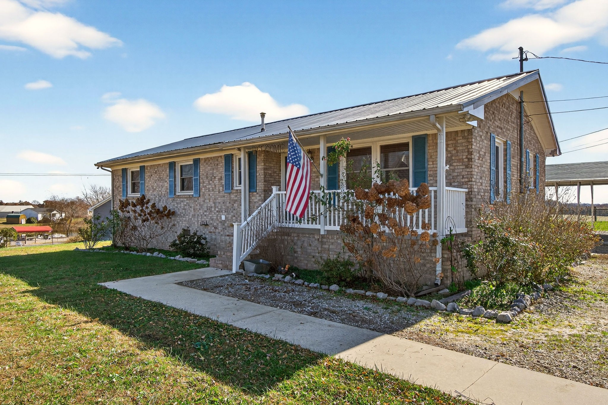 Welcome to this beautifully updated 3-bedroom, 2-bath all-brick home nestled on a spacious 1-acre lot. Featuring hardwood and tile flooring throughout, this home exudes warmth and durability. The inviting interior includes a dedicated laundry room and a contemporary kitchen with upgraded finishes.Relax and enjoy outdoor living on the covered deck or front porch, perfect for entertaining or simply unwinding. Recent improvements include a new roof and HVAC system (both replaced within the past 5 years), and an energy-efficient tankless water heater.The property boasts a fenced-in backyard—ideal for pets or kids—a detached garage for extra storage or workspace, and a 2-car carport that will convey with the home. This move-in ready gem offers comfort, convenience, and peace of mind with all the major updates already completed. 23x15 detached garage with concrete floor.