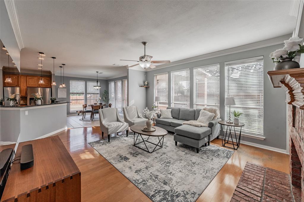 Welcome to 1029 Laurel Oak Drive in the heart of Flower Mound, a charming two-story home nestled in an established neighborhood known for its mature trees and relaxing atmosphere. The first floor offers a functional and inviting layout with versatile spaces that can be tailored to fit your needs. Just off the entry, the formal dining room provides an elegant setting for gatherings and can easily transition into an optional flex space if desired. The kitchen flows seamlessly into the breakfast nook and spacious living room, creating a natural environment for entertaining while allowing for easy everyday living. A striking double-sided fireplace anchors the living area and extends warmth and character into the adjacent flex space, currently used as a home office. A convenient half bath is located on the main level. The laundry room is also situated downstairs for added practicality. Upstairs, you’ll find all four bedrooms along with two full bathrooms. The primary suite is exceptionally spacious, offering ample room for a sitting area or additional furnishings. The secondary bedrooms are well-sized and share access to a full bath. The backyard provides a comfortable outdoor area to enjoy year-round. Surrounded by an established neighborhood filled with large, mature trees, the setting delivers timeless charm and a peaceful feel. Two neighborhood parks are located within a short walking distance, adding to the home’s everyday convenience and outdoor enjoyment. Located within Lewisville ISD and zoned to highly sought-after Flower Mound schools, 1029 Laurel Oak Drive combines space, character, and a prime location in one of the area’s most established and desirable communities. Schedule your showing today!