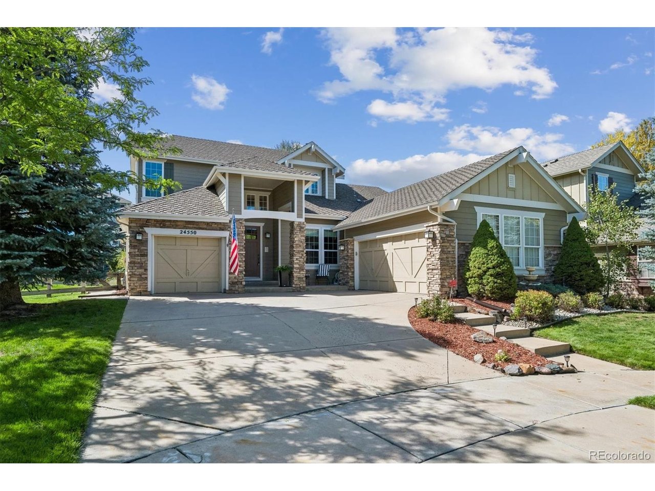 Curb appeal at its finest in highly sought-after Tallyns Reach! Located in the Cherry Creek school district, this beautifully maintained 5-bedroom, 5-bathroom home is ideally situated on a pristine cul-de-sac and offers an exceptional blend of style, comfort, and functionality. From the moment you arrive, you'll appreciate the beautifully manicured landscaping, impressive curb appeal, three-car garage, and extra-long driveway providing plenty of additional parking. Step inside to an open and inviting floor plan featuring soaring ceilings, designer paint, and beautiful hardwood floors. The main level offers a unique layout including a large family room with a stunning stone fireplace, plus an addtl open area flex room with endless possibilities. The kitchen shines with 42-inch cabinetry, newer granite counters, backsplash, and gas cooktop, butler's pantry, desk area, and a generous eating space. Main-floor laundry has option for a gas dryer and brand new tile flooring with cabinet storage. The spacious main floor primary suite features brand-new carpet and LVP flooring plus a HUGE walk-in closet. Major systems are already taken care of with a new furnace, A/C, and hot water heater in 2026, along with new windows in many areas.The finished basement is made for entertaining, featuring a wet bar with full-size refrigerator, expansive recreation space for pool or ping pong, a cozy TV area, plus a private bedroom and full bathroom. Outside, enjoy a wonderful patio, lush yard, gardens, and charming flower pots. Front/back Sprinklers and drip system.   Amenities include parks, swimming pool, playground, tennis courts, and pickleball courts.  This exceptional home offers an incredible combination of location, space, updates, and amenities at a great price. Move-in ready and just waiting for its new owner-don't miss the opportunity to make this impressive property your own!
