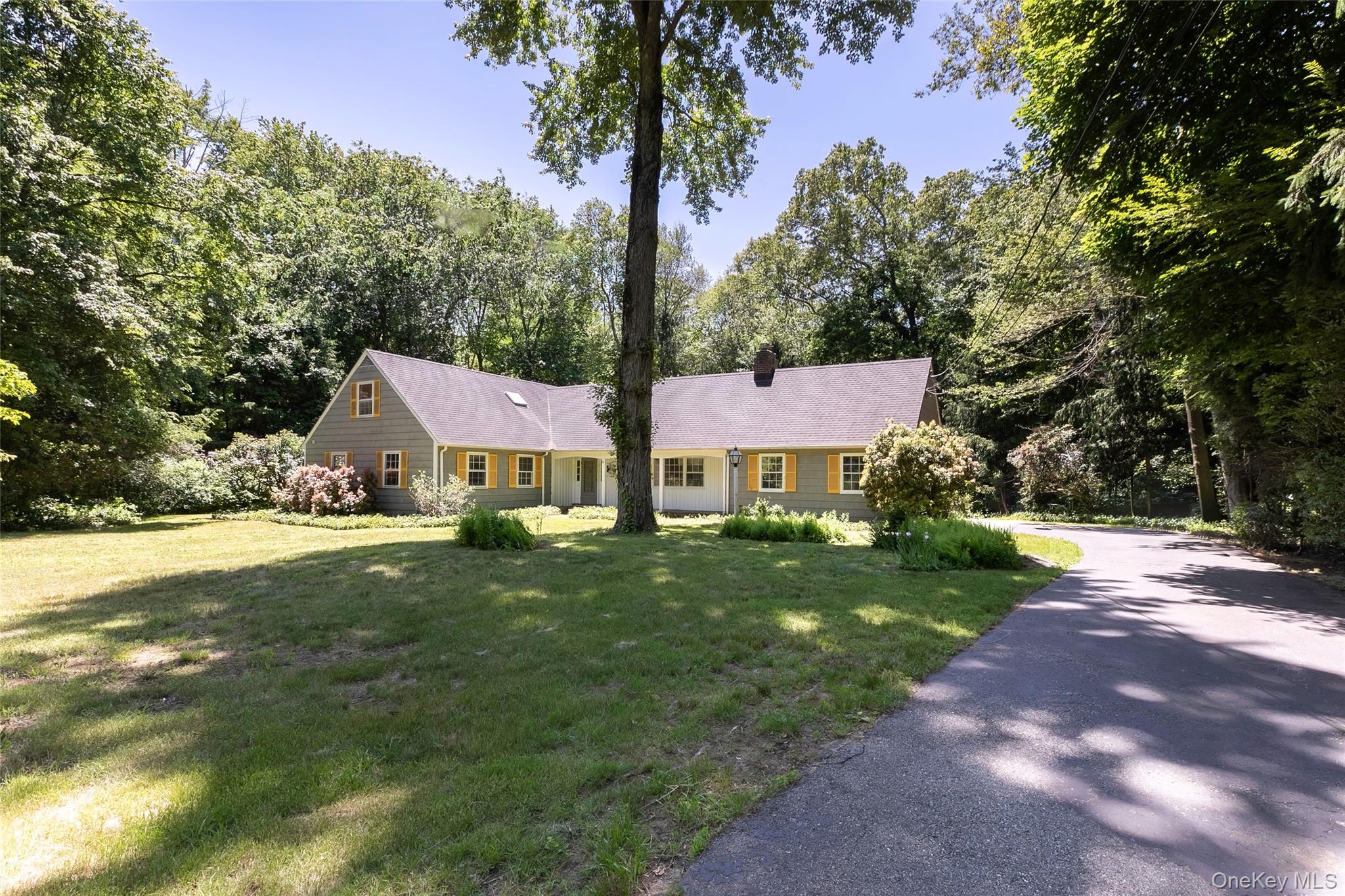 Set on 1.4 private acres, this 5-bedroom, 3-bath Bedford home offers a rare opportunity in a sought-after location. Move right in and update over time, or personalize the property to create your dream residence. The home features a flexible layout with a first-floor primary bedroom and en-suite bath, a full unfinished basement, attached 2-car garage, and generous space to make it your own. Recent updates include the roof, boiler, electrical system, and generator. Ready for your personal style. A compelling chance to create long-term value in Bedford.