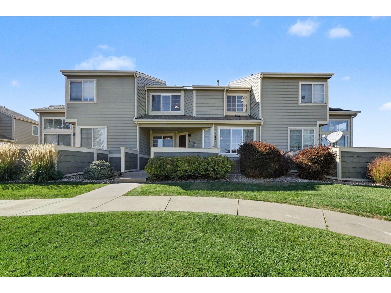 Welcome to 6615 Antigua Drive! Offering plenty of natural light, this two-story townhome features gleaming hardwood floors and an open main level centered on a cozy fireplace. The kitchen offers stainless steel appliances, oak cabinetry and a pass-through to the living area, which makes entertaining easy. Upstairs, two bedrooms each have their own full bath, and the vaulted primary suite includes a walk-in closet. Ceiling fans throughout, a main-level powder room and a full unfinished basement with laundry (washer and dryer included) give you storage now and room to finish later. Detached garage and mature, well-kept landscaping. Easy to see, so schedule your showing today!
