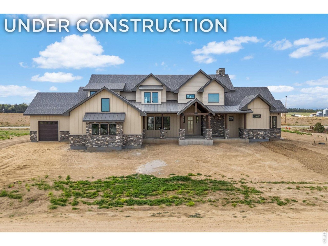 House is under construction with an estimated completion date of December 2026-January 2027. Showings are welcome with agent present. Welcome to a rare opportunity to own a stunning contemporary farmhouse crafted by ELMC Custom Homes, one of the region's most respected builders. Ideally situated in the newest luxury community of Hauck Meadows, between Longmont, Niwot, Erie, and Frederick. This property offers the best of Colorado living - sweeping mountain and prairie views and a thoughtfully designed floor plan with high quality finishes. Set on a generous .83-acre lot, the home invites in the Front Range and farmland to the South. The main floor is designed for both comfort, flexibility and multi-generational living. With a private primary suite, an open-concept living, dining, and kitchen area with soaring 20-foot ceilings, a dedicated home office and guest quarters. The well-appointed kitchen includes stylish Cafe appliances and a large island, perfect for the home chef. A spacious laundry and mudroom adds everyday practicality, while a thoughtfully appointed guest wing - complete with its own bedroom, bathroom, living area, and kitchenette - offers exceptional versatility for multi-generational living or guests. A covered deck off the main floor dining area extends the living space outdoors, creating the perfect setting for entertainment. Upstairs, a loft lounge area, three large bedrooms and two more bathrooms make this home ideal for any group. The unfinished 2,929 sq ft basement offers a blank canvas ready to become whatever you envision: a recreation room, home theater, gym, or additional living quarters. A three-car garage with 11-foot ceilings and EV charging rounds out this exceptional property, providing ample room for vehicles, gear, and all the toys Colorado living demands. High efficiency HVAC units will make for low monthly bills. Additional outbuilding is allowed up to 800 sq ft.