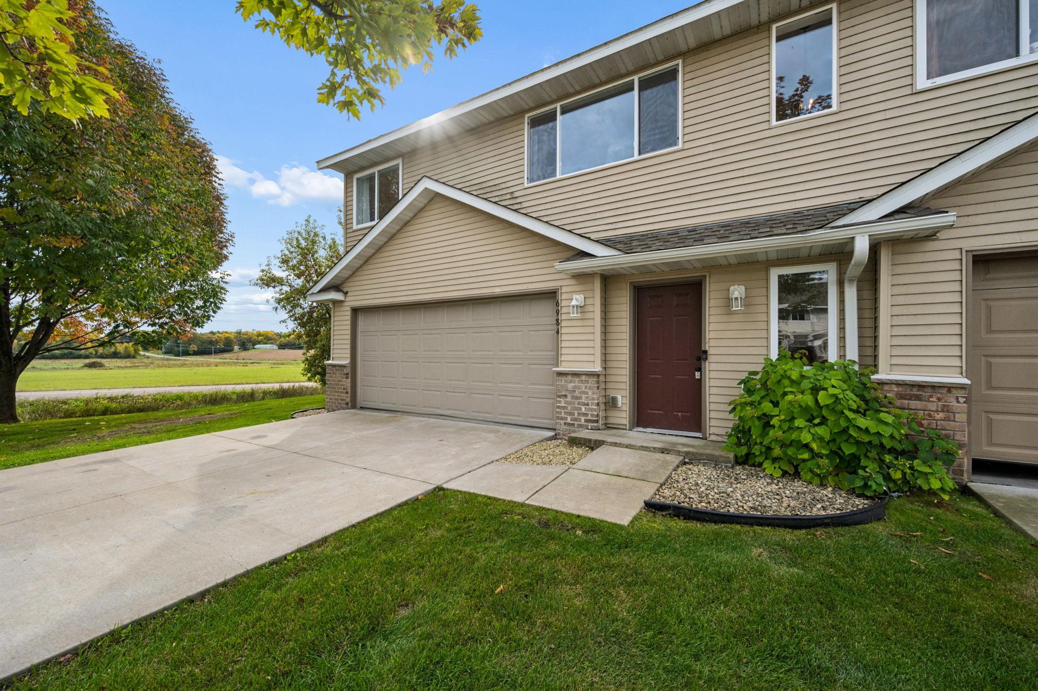 Picture perfect, completely move-in ready, and nestled in the heart of Monticello! This beautifully remodeled 3-bedroom, 2-bath, end unit townhome offers fresh, modern updates throughout. The main level features a spacious primary bedroom with a private ¾ bath, along with new flooring, fresh paint, and new appliances. The kitchen offers soft-close drawers, a walk-in pantry, and a clean, updated look, while the inviting living area features an electric fireplace, perfect for cozy evenings at home. Convenient main-level laundry with washer and dryer included. Every detail has been thoughtfully updated, making this home truly turn-key. Enjoy the absolute best of Monticello living—you are just minutes from the vibrant downtown dining scene, excellent shopping, and the expansive Mississippi River park system. Take advantage of nearby Bertram Chain of Lakes Regional Park for hiking, swimming, and winter swan viewing, or enjoy the top-tier Monticello Community Center. Plus, an easy commute to both St. Cloud and Minneapolis via quick I-94 access makes this location unbeatable. Don’t miss this absolutely beautiful townhome!