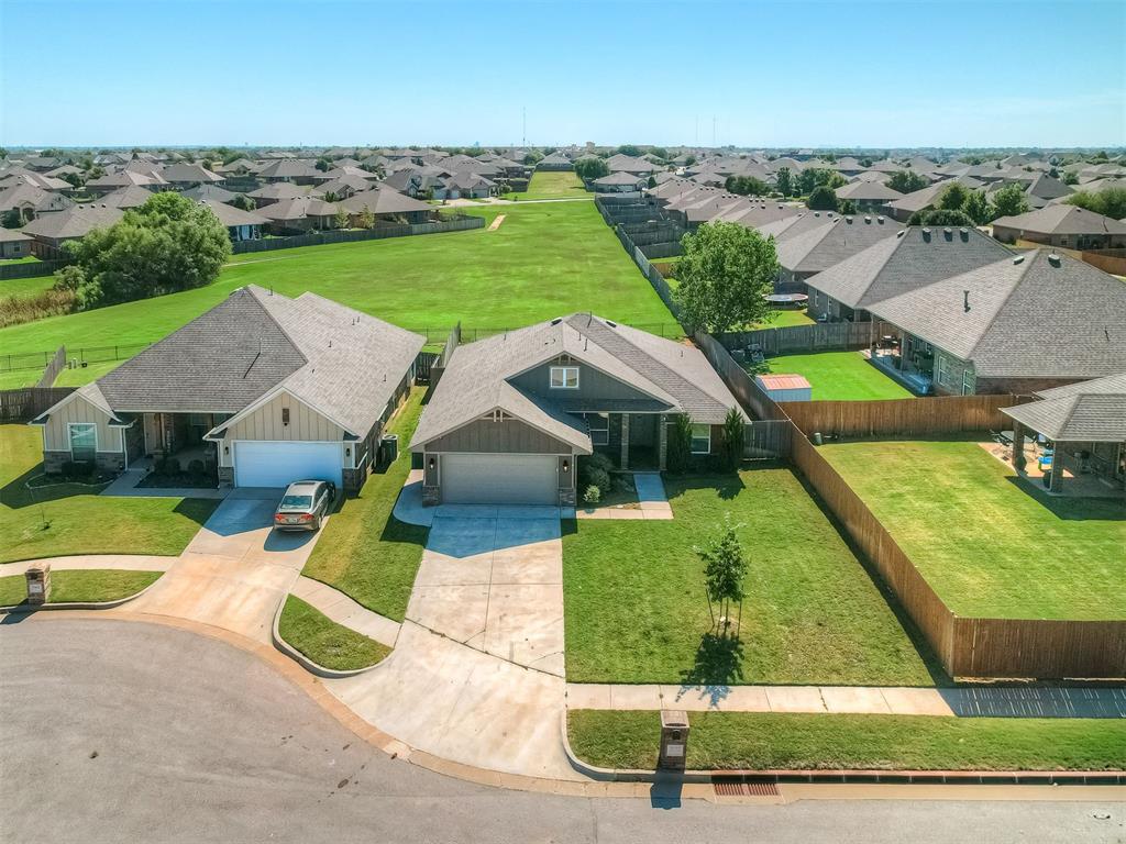 Welcome home to comfort and style in award-winning Deer Creek School District! Tucked away in a quiet cul-de-sac, this 3-bedroom, 2-bathroom home with a study and sits on a large lot backing to a greenbelt—giving you extra privacy with peaceful views out back.
Inside, you’ll find an open-concept kitchen with stainless steel appliances including a gas cooktop, quartz countertops, and plenty of dining space that flows seamlessly into the living room. The cozy fireplace makes this area ideal for entertaining or relaxing at the end of the day.
The primary suite is a true retreat with a spa-like bathroom featuring a walk-in shower, soaking tub, dual sinks, and an oversized closet. The split floorplan gives the secondary bedrooms their own space, and the study is perfect for a home office, playroom, or flex space.
Upgrades you’ll love: crown molding, ceiling fans, an in-ground storm shelter, and a full sprinkler system.
Step outside and enjoy your backyard oasis—complete with a large patio and pergola overlooking peaceful greenbelt views. Whether it’s morning coffee or evening dinners, this space was made for outdoor living.
The Grove amenities include 2 community pools, 2 gyms, playgrounds, walking trails, and stocked ponds! Prime location near highways, shopping, restaurants, and entertainment hotspots!