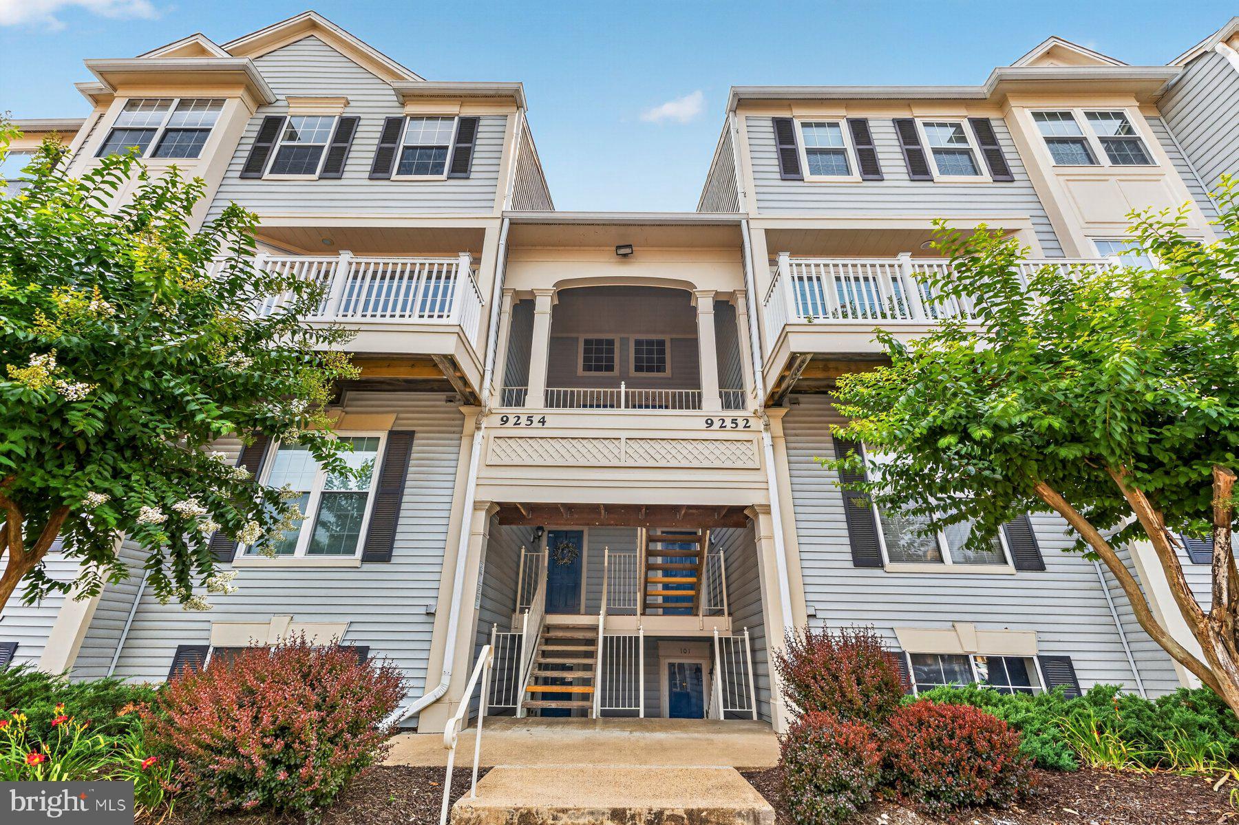 Move right in and start enjoying low maintenance living in this beautifully updated two level condo in the highly sought after Gunston Corner community of Lorton. Offering an open and inviting floor plan, an updated kitchen, a private balcony, two spacious bedrooms, and two and a half bathrooms, this home has everything you need.The main level welcomes you with rich hardwood flooring that flows throughout the open living and dining areas. A cozy gas fireplace with a classic white mantel creates the perfect focal point, while oversized windows fill the space with natural light. Step outside to your private balcony, the perfect spot to enjoy your morning coffee or unwind after a long day. The kitchen is dynamite and features white cabinetry, granite countertops, and stainless steel appliances including a gas range, microwave, dishwasher, and refrigerator. It opens seamlessly to the dining area, making entertaining a breeze. A convenient powder room completes the main level.Upstairs, retreat to the spacious primary bedroom featuring a soaring vaulted ceiling, ceiling fan, and a generous walk in closet. The second bedroom is bright and spacious with ample closet space. Both bedrooms share a well appointed bathroom with dual sinks and a tub and shower combination. A laundry closet with a washer and dryer adds everyday convenience.Major updates provide peace of mind, including an HVAC system replaced in 2017 and a water heater replaced approximately two years ago.  The roof is maintained by the condo and was replaced in 2014. One assigned parking space and plenty of visitor parking.Located within the sought after Laurel Hill Elementary, South County Middle, and South County High School pyramid, this home offers an exceptional location for both families and commuters.The Gunston Corner HOA covers common area maintenance, lawn care, road maintenance, snow removal, and trash service. Residents also enjoy outstanding community amenities including a clubhouse, swimming pool, and beautifully maintained common areas.Commuters will love the quick access to I-95 and the nearby Lorton VRE station, making travel into Washington, DC simple and convenient. Shopping, restaurants, parks, and outdoor recreation are all just minutes away.With stylish updates, low maintenance living, fantastic community amenities, and an unbeatable location, this move in ready home checks every box. Some photos have been virtually staged. Schedule your private showing today before this one is gone!