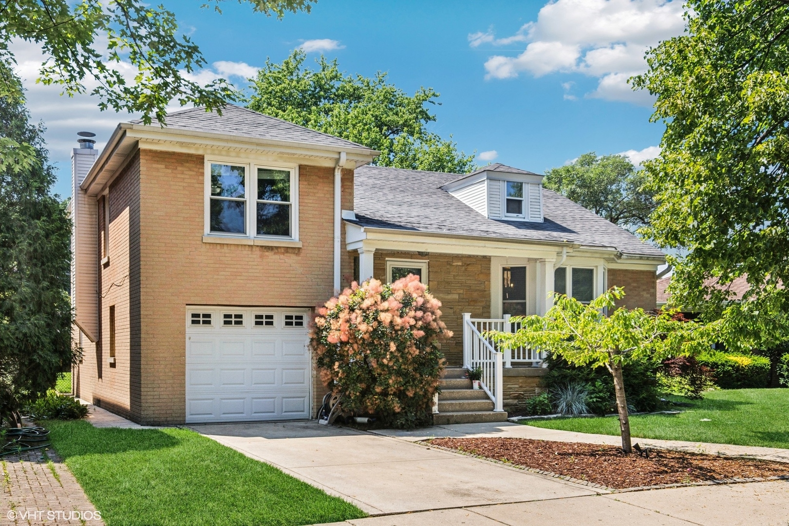 Nestled in the heart of Sauganash, this charming brick home sits on a lovely, oversized lot, offering a beautiful park-like backyard with plenty of green space to enjoy and room for a large, inviting front porch to welcome you home! Inside, discover a bright layout that flows nicely from the welcoming living/dining room, featuring Brazilian hardwood floors and crown molding, to a well-appointed kitchen with granite counters, cherry cabinets, newer stainless steel appliances, and a cozy eat-in area. The family room is ideal for entertaining, boasting a stone fireplace and patio doors that lead out to the expansive, fully-fenced backyard. An updated full bath and a large 1st floor bedroom complete the main level. Upstairs, find two generously sized bedrooms and a second full bath, along with two large unfinished attic spaces that offer excellent potential for customization or expansion. An expansive full basement provides abundant storage and a versatile second family room or recreation area, as well as another bathroom! Attached garage with side drive! Easy access to I-94, Whole Foods, Metra, and all public transportation! Just steps from beautiful parks, biking/walking trails that stretch for miles, and top-rated schools! Move right in and enjoy all that this wonderful community has to offer!