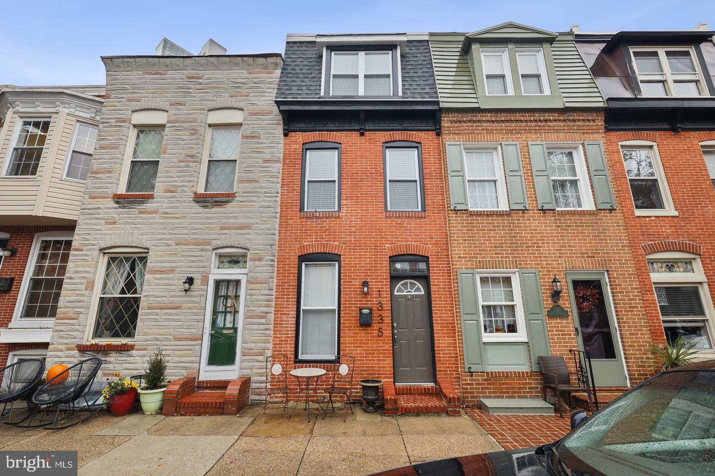 Welcome to 1335 Andre St — a charming three-story home in the heart of Locust Point! This beautifully maintained rental offers 2 bedrooms, 2 full bathrooms, and multiple flexible living spaces, including a den that can easily be used as a home office, TV room, or additional lounge space. Step inside to an inviting open-concept main level featuring gleaming hardwood floors, abundant natural light, and a cozy electric fireplace that creates the perfect ambiance on chilly evenings. The well-organized kitchen provides easy access to the large rear deck, making outdoor dining and entertaining a breeze. The second floor features a spacious bedroom, an additional living area ideal for a home office or sitting room, and a full bathroom. Upstairs on the third floor, you'll find the second bedroom, a generous walk-in closet, and another versatile den space that can be tailored to your needs.The home also offers a finished basement with a full bathroom, laundry room, and flexible space that's perfect for a home gym, recreation area, or additional storage. Located in the highly walkable Locust Point neighborhood, this home puts you close to neighborhood shops, restaurants, parks, and everything the area has to offer.