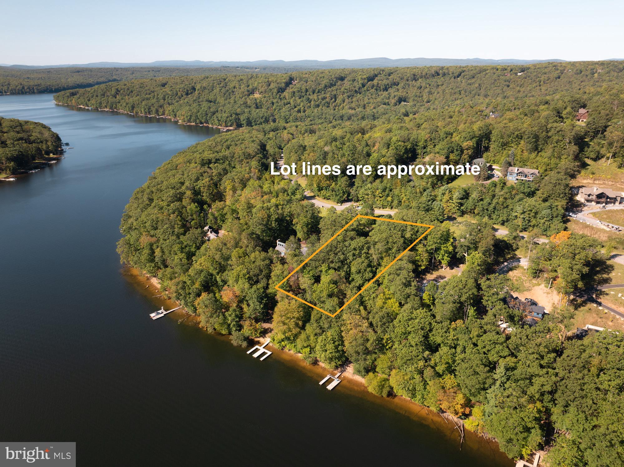 Rare opportunity to own a premier lakefront homesite in the highly sought-after Waterside at Wisp community! Lot 12 is 1.35 acres that  offer an expansive 150 ft. lake frontage and picturesque Deep Creek Lake views, providing the perfect setting to design your dream home. This property conveys with the seller’s previously purchased buy-down (2008), creating additional flexibility and long-term value. Nestled near Wisp Resort, State Parks, and area amenities, this lot combines privacy with year-round recreation right at your doorstep. Don’t miss your chance to invest in one of Deep Creek’s most desirable waterfront communities!
