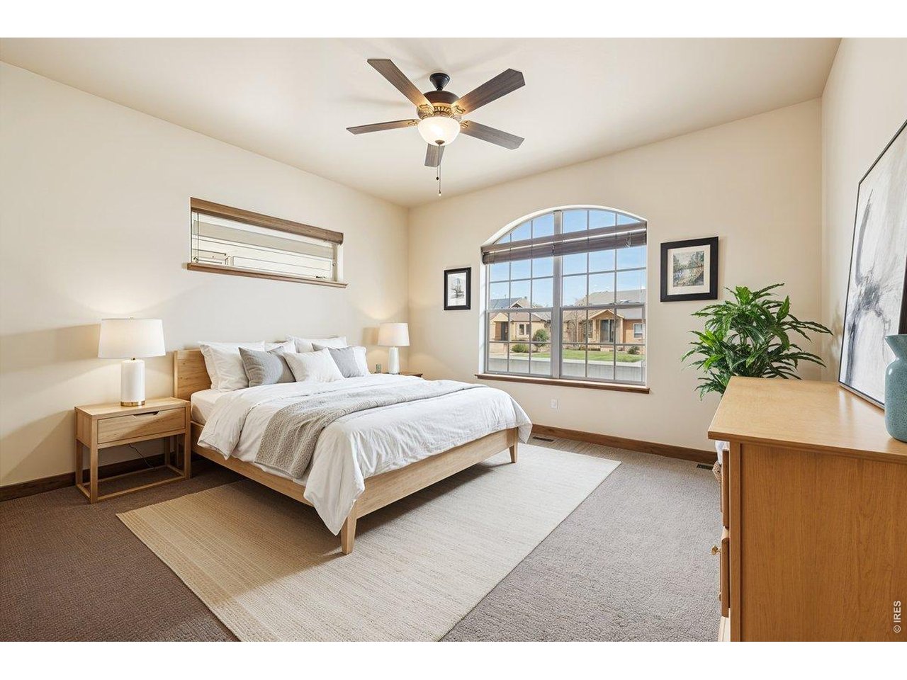 You will feel right at home from the moment you walk in! This open floor plan provides easy main-level living w/Knotty Alder woodwork, hardwood floors, & plenty of natural light in the kitchen, dining, & living spaces. Sliding glass doors lead to a spacious covered deck w/gas hookups & panoramic mountain views. The living room features a stone fireplace, ideal for winter evenings, while the kitchen & dining area includes a two-tiered granite island, great for entertaining family & guests. The primary bedroom features an ensuite bath, tray ceiling, access to the rear deck, & a window bench seat w/storage, perfect for reading & mountain views. The primary bath has a tiled shower, double vanity, and a closet with custom cubbies. The main level also features a spacious second bedroom, large closet w/sliding doors, a guest bath w/a tiled shower, linen closet, Plus a versatile flex room that can be utilized as a bedroom or an office. The main level laundry room includes a laundry sink, storage space, & countertop that's perfect for folding clothes. The partially finished, walk-out basement, features a unique stained concrete floor & wood accent wall, and is perfect for game night. The wet bar area is fully plumbed & prepared for customization to your specifications. The walkout screened patio offers an ideal setting for private relaxation while taking in the surrounding views. The unfinished portion of the basement gives the home 3 large storage areas or additional space for your interests. The property features a three-car tandem garage suitable for vehicle storage & additional equipment. Recent updates include a new Class 4 roof, plus a new garage door, complete w/remote, & a freshly painted exterior. This residence is move-in ready & includes a 1year First American Home Warranty Basic pkg., provided by the listing agent. The HOA offers landscape maintenance & snow removal. HOA-approved fencing is permitted. No Metro District. (Note some photos are virtually staged.)