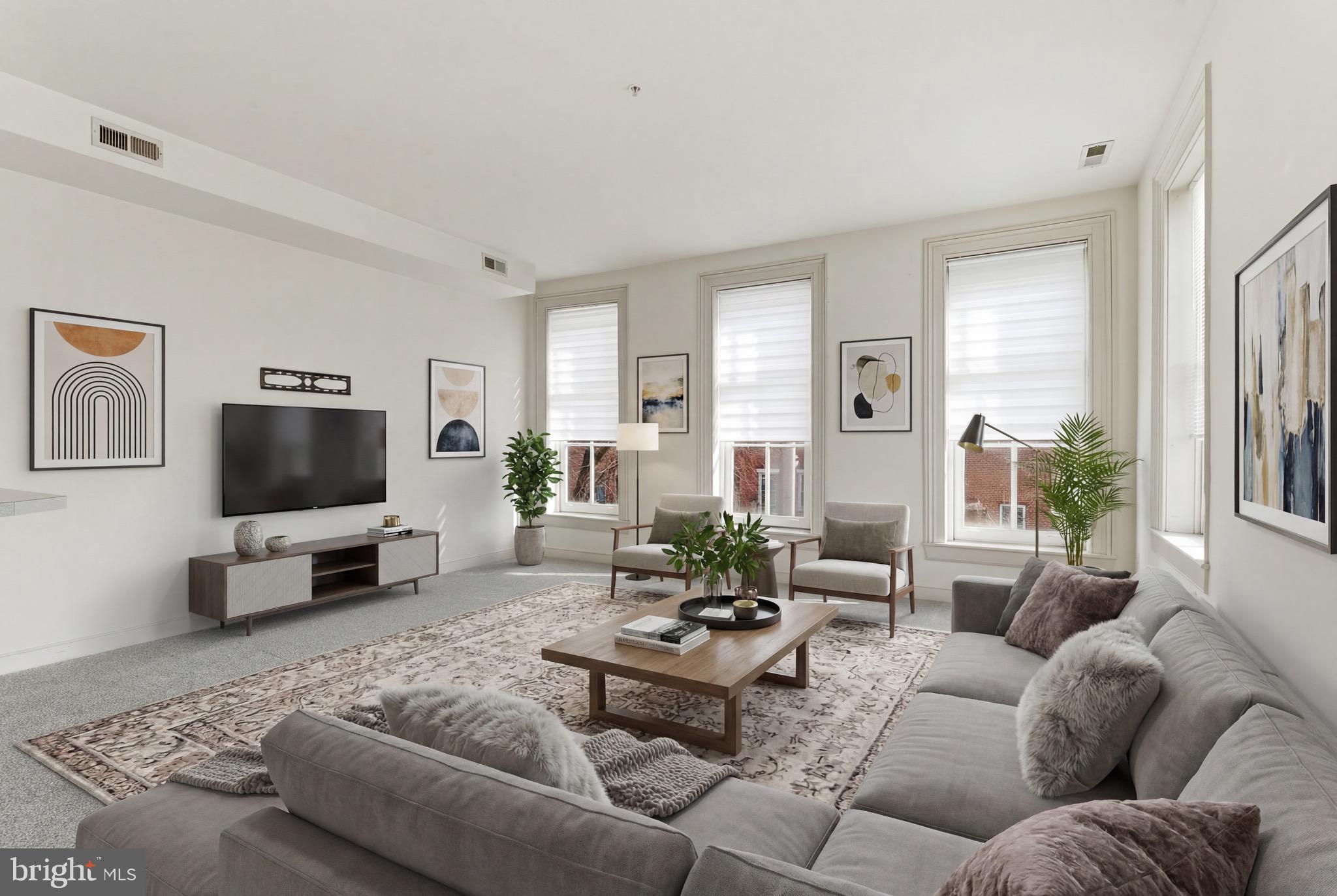 NEW carpet just installed throughout. 2nd floor End of Group 3br/2ba apartment that is light-filled in a secure building in north Federal Hill with easy access to commuter routes. Featuring a HUGE living room with a kitchen bar pass-through. Full-size washer/dryer in unit. Bedrooms are separate from the living area in the unit. Two bedrooms share a common hall full bathroom and the back bedroom has an ensuite full bathroom. Unit entrance is on 2 W. Henrietta St. Available now...landlord is looking for a lease start on or before March 15th 2026. 12-16 Month lease term preferred.  Unit comes unfurnished. Tenant pays all utilities. Tenant to verify availability of Area 9 residential parking permit. AirGarage manages the parking lot behind the building; monthly parking may be available—tenant to confirm pricing and availability directly. $39.99 application/credit/background fee per tenant via RentSpree. One-time $60 flat fee due with first month’s rent, payable to Cummings & Co. Realtors.