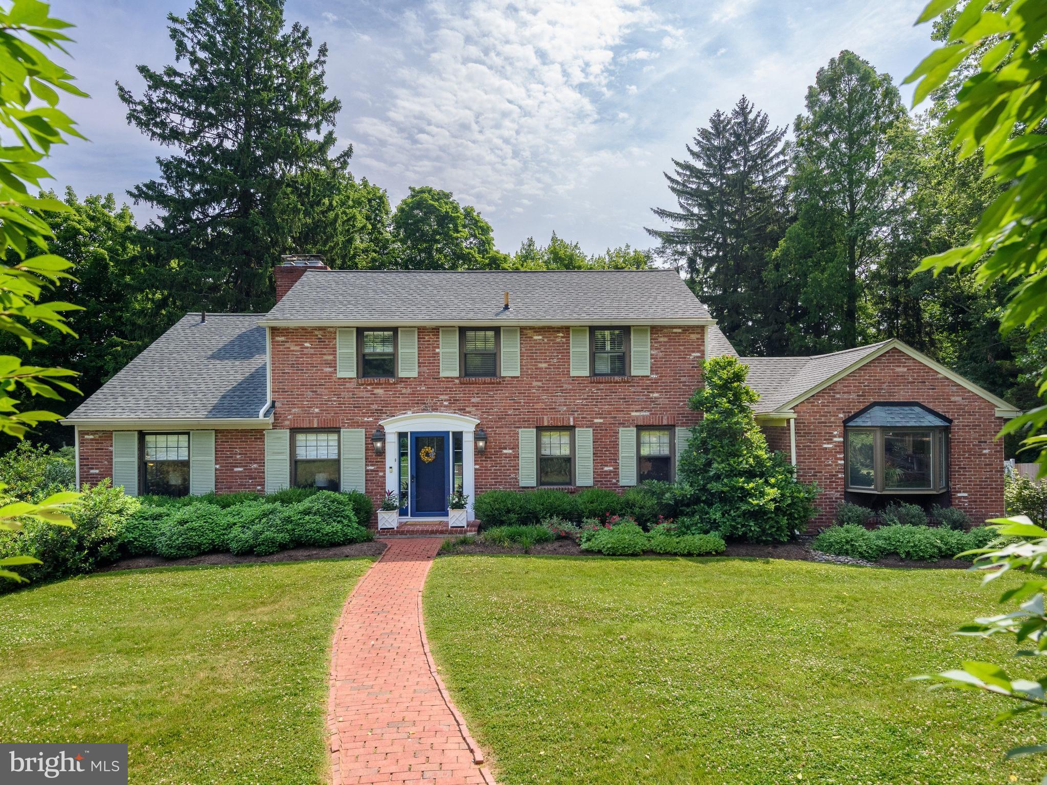 Welcome to 2 Porteous, an exceptionally spacious home nestled on a quiet cul-de-sac street in the highly sought-after Daylesford neighborhood of Berwyn, award winning TE School District. Offering approximately 3,200 square feet of living space, this 6-bedroom, 3.5-bath residence combines timeless character, modern updates, and outstanding indoor-outdoor entertaining spaces.A gracious center hall entry welcomes you into the home, where hardwood floors flow throughout the main and upper levels. The step down formal living room features 9-foot ceilings and a gas fireplace, while the elegant dining room offers custom built-ins for both charm and functionality.The eat in kitchen boasts cherry cabinetry, quartz countertops, tiled backsplash, GE Monogram stainless steel refrigerator, six-burner double-oven gas range, professional hood system with warming shelf, built-in desk area, generous walk-in pantry with side door to driveway.The unique front-to-back split-level design provides exceptional flexibility. Just a half flight upstairs, the primary suite features a private en-suite bath, accompanied by three generously sized bedrooms and a renovated hall bath with double vanity. An additional half flight leads to two more bedrooms, a full hall bath, and convenient access to walk-in attic storage.Designed for entertaining, the expansive lower level was beautifully renovated in 2023 and features a stunning family room flanked by a flagstone hearth with pellet stove and an impressive entertainment kitchenette complete with sink, microwave, dishwasher, and full-size refrigerator. The adjoining super bright sunroom, also renovated in 2023, includes a built-in bar area and overlooks the serene, private backyard.Additional highlights include a renovated spacious laundry room, updated powder room, and a thoughtfully designed mudroom/drop zone with built-ins that connects directly to the attached two-car garage. Storage is abundant with walk-up attic space, crawl space, and a newly installed storage shed (2024).Step outside to your own private retreat featuring mature privet hedges, a tranquil backyard setting, an 8-foot deep in-ground pool, spacious patio with built-in firepit—perfect for entertaining family and friends. Ample driveway and street parking provide room for even the largest gatherings.Recent improvements include a high-efficiency four-zone gas heating system (2021) and water heater (2025).Ideally located near Daylesford Train Station, Paoli Train Station for express train & NYC, Upper Main Line YMCA, Conestoga High School, Tredyffrin Easttown Middle School, and neighborhood walking, biking, and jogging routes, this exceptional property offers the perfect blend of comfort, convenience, and lifestyle.