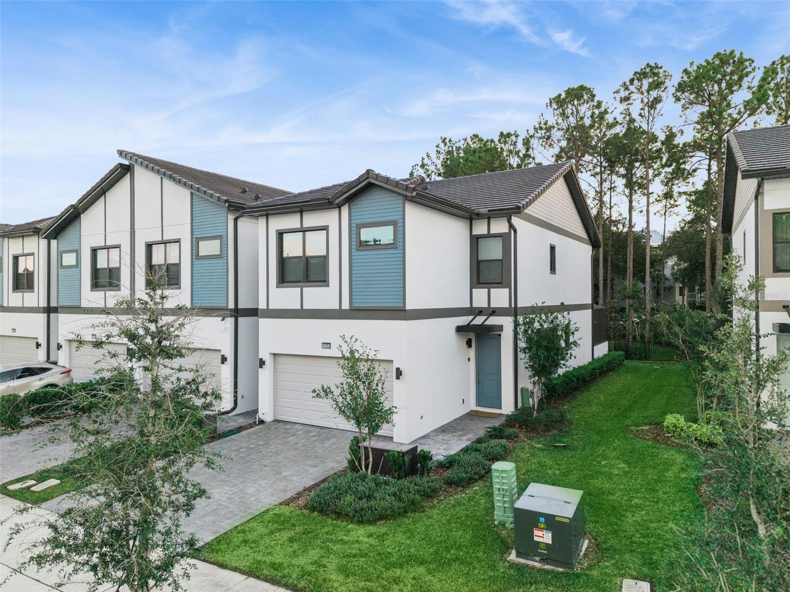 Spectacularly themed and fully furnished, this end-unit townhome in the sought-after Paradiso Grande Resort is one-of-a-kind! Designed to impress guests and investors alike, this stunning five-bedroom, five-bath residence offers over 1,900 square feet of beautifully curated living space, featuring nearly $150,000 in custom décor and design upgrades that make it a standout among Orlando’s luxury vacation homes. Go inside to discover a world of imagination and style, from meticulously designed themed bedrooms that delight guests of all ages to the professionally decorated open-concept living and dining area that blends modern elegance with a fun, resort-like atmosphere. Every space has been thoughtfully crafted for comfort and wow factor. The garage has been transformed into a fully air-conditioned game room, providing additional entertainment and making it ideal for rental appeal and guest enjoyment year-round. Outside, enjoy your private heated pool with spa jets, ideal for relaxing after a day at the parks or entertaining family and friends. As an end-unit, this home offers extra privacy and natural light, enhancing its premium feel. In Paradiso Grande, the only vacation-home community right on International Drive, residents and guests have access to world-class resort amenities, including a tropical swimming pool with lazy river, state-of-the-art fitness center and on-site convenience market. Just minutes from SeaWorld, Universal Orlando, the Convention Center and endless dining, shopping, and entertainment options of International Drive, this property combines unbeatable location with top-tier design. Whether you’re seeking a turnkey short-term rental investment or a luxurious vacation retreat, this spectacular home delivers the ultimate Orlando resort experience. Paradiso Grande, where unforgettable memories and exceptional returns meet.