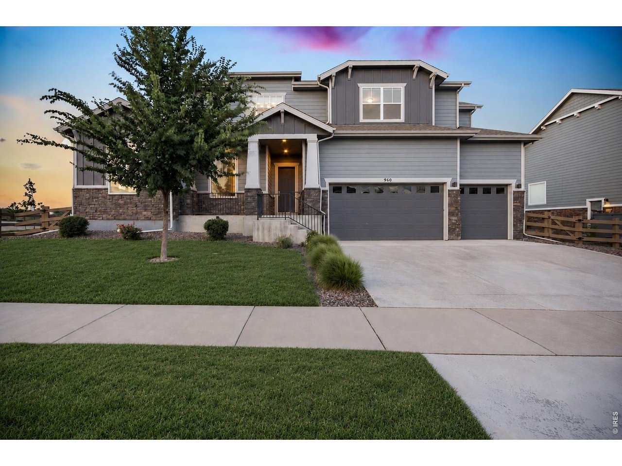 Perched on a premium lot looking out onto Kitchel Lake in Timnath's sought-after Serratoga Falls, this 2021-built craftsman blends designer style with unbeatable Front Range and farmland views! Inside, an open-concept main level showcases luxury vinyl plank floors, a private French-door study, and a soaring two-story great room anchored by a floor-to-ceiling tiled gas fireplace and walls of windows framing the wide-open backdrop.The gourmet kitchen is a showstopper: crisp white cabinetry, a large quartz island, stainless steel appliances with gas cooktop and double ovens, custom tile backsplash, and a walk-in pantry, all open to the dining nook and living area for effortless entertaining. Sliding doors lead to a beautifully landscaped, low-maintenance backyard with an extended paver patio and turf overlooking the fields beyond.The main-level primary suite is a serene retreat, featuring a wood-slat tray ceiling, open-space views, and a spa-inspired bath with freestanding soaking tub, glass shower, dual vanities, and walk-in closet. Convenient main-floor laundry adds everyday ease. Upstairs, a versatile loft with iron railings and a built-in desk nook overlooks the great room, joined by generous secondary bedrooms and stylish full baths. The professionally finished basement delivers a massive rec room, additional bedroom, and full bath, ideal for guests, gym, or media. Complete with a 3-car garage and standout curb appeal, and just minutes to Timnath Reservoir, top-rated schools, parks, shopping, and I-25 for an easy commute to Fort Collins and beyond. Move-in ready and better than new, this one truly has it all!