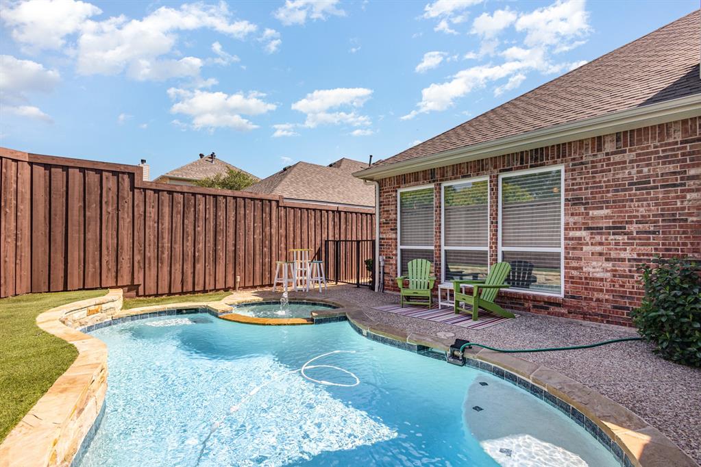 Welcome to this beautifully updated home in the Woods of Russell Creek. From the moment you step inside, you’ll notice the hardwood floors, decorator paint, and large windows that fill the living spaces with natural light plus custom electric blinds throughout to complete the space. The open floor plan seamlessly connects the island kitchen, breakfast room, and family room, creating a bright and inviting atmosphere. The primary bedroom is oversized and down with 2 closets, updated primary bath with jetted tub and oversized shower plus another guest bedroom down with updated bath as of this week. Large gameroom plus 3 abundant bedrooms welcomes you upstairs. The kitchen features Quartz counters, ceramic tile backsplash, tile floors,  an absurd amount of counter space, gas cooktop—perfect for everyday living and entertaining. Recent improvements include a new garbage disposal, drip irrigation system, and a smart sprinkler controller. Step outside to a private backyard retreat highlighted by a resurfaced pool with new tile and jets (2024). Major updates provide peace of mind, including a new roof, gutters with guards, siding replacement, and whole-house paint (2023). Additional touches include refreshed bathrooms and thoughtful upgrades throughout. This home combines style, comfort, and functionality in a sought-after Plano neighborhood. Don’t miss your chance to enjoy a move-in ready property with modern updates and a resort-style pool and spa with turf landscaping for easy use. Hurry!!!