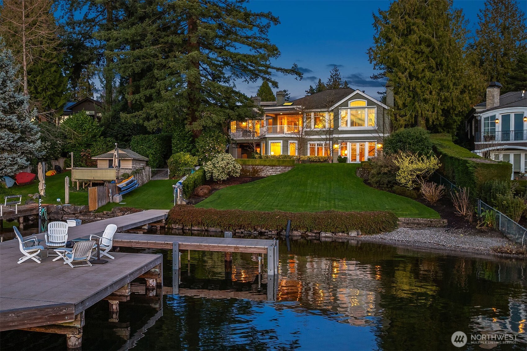 Coveted west-facing waterfront in sought after Yarrow Point! An exceptional Paul Saad custom home built with high quality materials and craftsmanship. A timeless design featuring distinctive Northwest artists details that add warmth and character throughout. Excellent floorplan with seamless indoor-outdoor living. Gracious living and dining rooms. Wonderful epicurean kitchen with striking butcher block island & custom cabinetry complemented by a generous dining area that flows seamlessly into the dramatic family room with river rock fireplace. Expansive windows showcase the views from almost every room. A wonderful office with warm wood accents, a gas fireplace, built in desk and shelving.  Beautiful main floor primary suite with custom built-ins, gas fireplace and spacious 5-piece bath. French doors lead to the expansive view deck. Huge lower level with recreation room with beer tap, Sub-zero and custom cabinetry. Another flexible space provides endless possibilities for games, entertaining, hobbies, and everyday living. Spacious 1,100+ bottle wine cellar. Above the 3 car garage, is a versatile space featuring a bedroom, bathroom, kitchen, and family room. Perfect for guests, offering privacy, comfort and a peek a boo view of the lake. Beautifully manicured gardens. A rare opportunity to experience Northwest living at its finest.