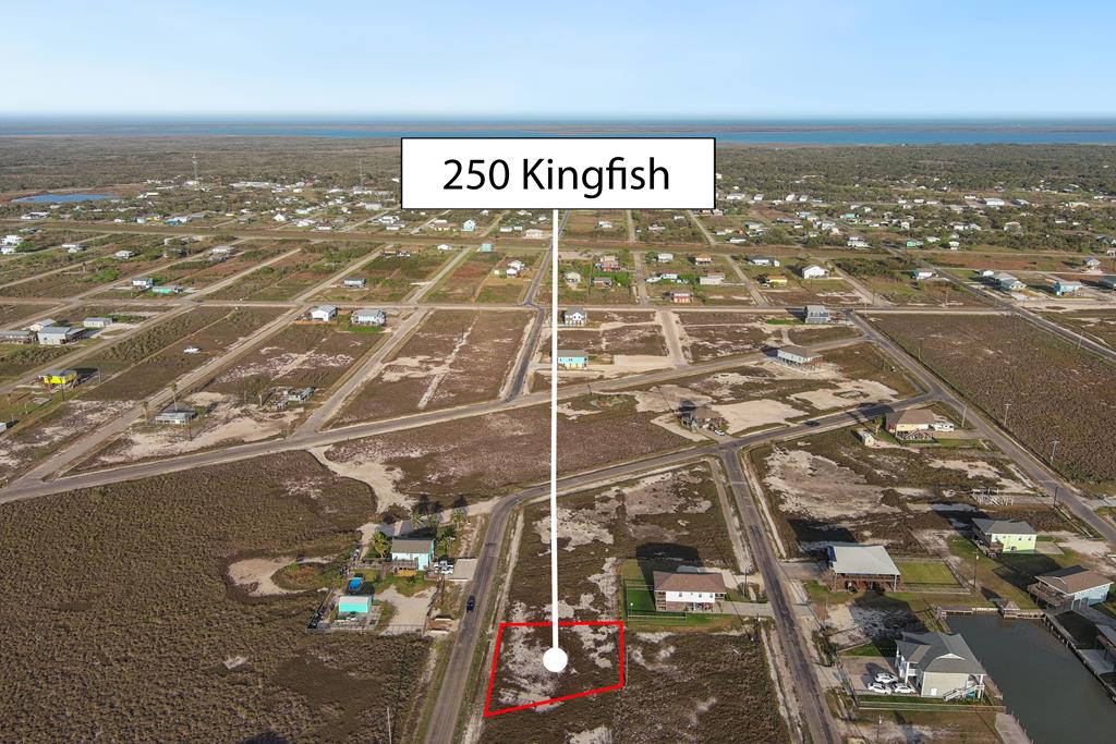 This spacious 10,600 sq ft (.24 acre) lot is located in the sought-after Palmetto Point section of Holiday Beach and offers beautiful water views just 300 yards from the community boat ramp. With public water available and electric nearby, it's ready for your custom home or vacation retreat (septic needed). Enjoy access to top-tier neighborhood amenities including a private boat ramp, community fishing pier, pool, and park, all just minutes from Copano Bay, Goose Island State Park (less than 5 miles), and the heart of downtown Rockport (about 12 miles). The lot is cleared and level with deed restrictions in place (no mobile homes or RVs), ensuring the area maintains its integrity. Bonus: A Jurisdictional Determination has already been completed, so you can move forward with confidence. Don't miss this opportunity to claim your slice of the coast!