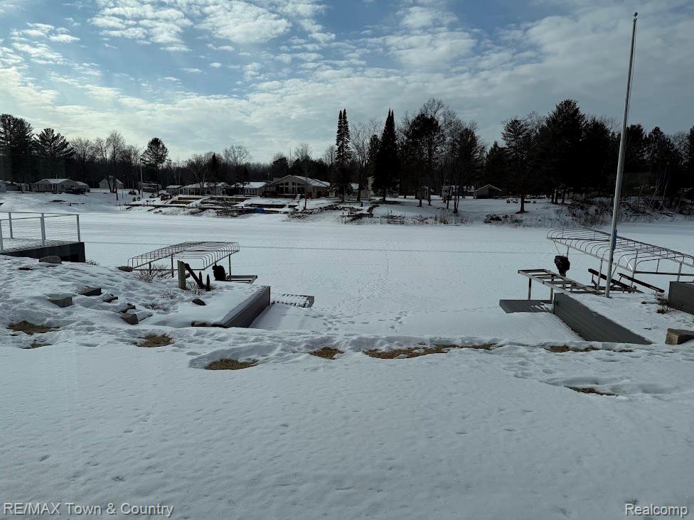 Stunning newly built custom home with 101 feet of frontage on the main branch of beautiful Secord Lake! This move-in-ready waterfront property offers the perfect setting to relax, entertain, and enjoy lake life at its finest. Thoughtfully designed for comfort and style, this home is ready for you to start making unforgettable memories from day one. Located on paved roads and surrounded by a community offering numerous amenities, you’ll appreciate both convenience and recreation right at your fingertips. Whether you're enjoying peaceful mornings by the water or hosting gatherings with family and friends, this exceptional property truly captures the best of waterfront living. Contact the office for a full list of amenities and features.