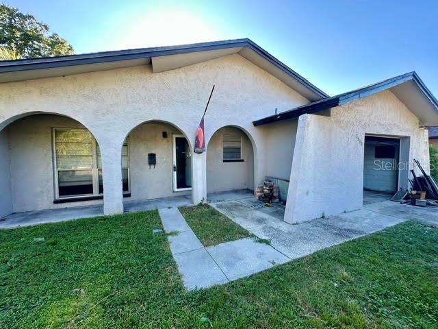 Under contract-accepting backup offers. **Investor Special- Renovation Opportunity in Pinellas Park!** Bring your vision and transform the 3-bedroom, 1.5 bath home into something special. Featuring a single-story layout, attached garage, covered front porch, and big backyard, this property offers an opportunity for investors, renovators or buyers seeking a full renovation project. The home requires extensive updating and renovation throughout, allowing the next owner to reimagine the interior and make it their own. Conveniently located near shopping, dining, parks, and everyday amenities in Pinellas Park. Easy commute to Tampa. Bring your contractor and explore the possibilities. Cash only due to condition. Recent inspection report available in MLS attachments.