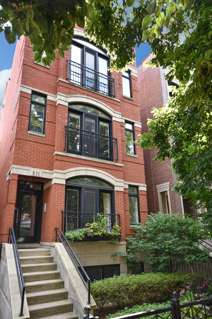 Discover this exceptional 2-bedroom, 2-bathroom home built in 2009, perfectly positioned in the heart of Lakeview East/Lincoln Park on a peaceful park-like street between Sheffield and Halsted. With a walk score of 94, you're just steps away from the Diversey L, Lake Michigan, Lakeshore Drive, and Weisman Park-plus it's located in the sought-after Alcott school district.  Set in a solid all-brick and limestone building, this thoughtfully updated residence is packed with high-end details throughout. The chef's kitchen boasts Viking and Bosch appliances, a custom backsplash, and sleek finishes. The spa-like primary bath features a Grohe steam shower with rain head and body sprays, custom tile work, and a clean modern aesthetic.  Walk-in closet with professional built-in's.  Guest bath fully updated in 2024.  Enjoy Brazilian cherry hardwood floors, elegant wainscoting, detailed crown molding, and freshly painted walls. Cordless blinds and an in-unit washer/dryer make everyday living easy, while state-of-the-art surround sound adds that extra layer of luxury.  Enjoy the convenience and high energy efficiency of the updated HVAC system installed in 2023.  Step outside to your freshly installed private composite deck (2025) ideal for entertaining or relaxing. Deck features hardline gas hook ups for your grill and electric access.  Back stairs have been freshly updated and sealed with rust resistant paint (2025).  Additional on-site private secure storage (4.5x4.5) and secure remote-access garage parking with new garage door and opener (2023) included.