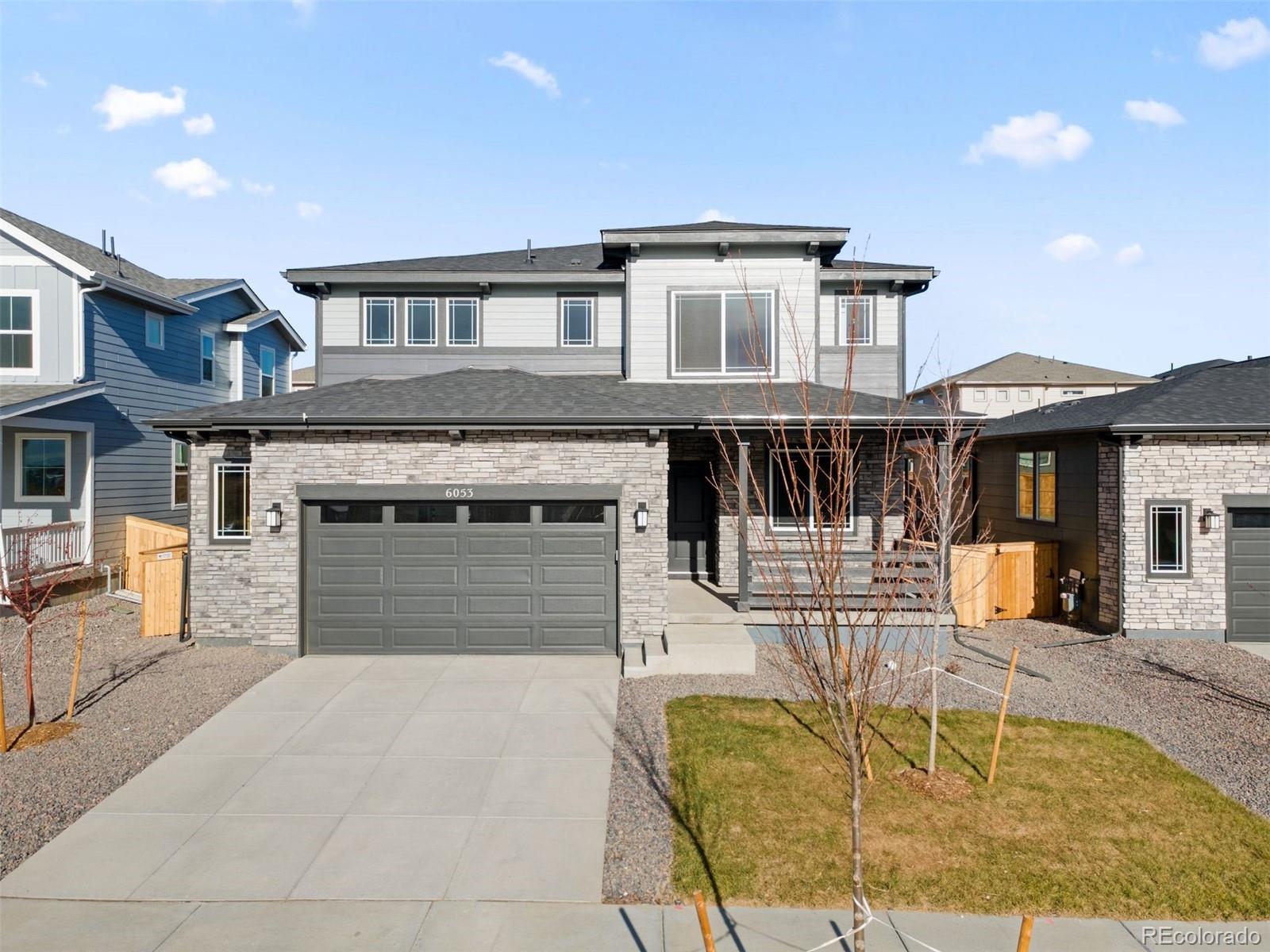 This thoughtfully designed 4-bedroom, 3-bath home offers the perfect blend of style and versatility. A main floor bedroom and full bath provide an ideal setup for guests, multi-generational living, or a private home office.The chef-inspired kitchen showcases Mastercraft 36" upper cabinets, sleek quartz countertops, a full subway tile backsplash, and stainless steel appliances including a gas range. The open-concept layout flows seamlessly into the living and dining areas—perfect for everyday living and entertaining. A built-in bench in the mudroom and central A/C add comfort and convenience.Upstairs, the spacious primary suite features dual sinks and a well-appointed layout. An oversized 2-car garage with an 8’ door offers generous space for vehicles, storage, or hobbies.Enjoy the benefits of a low $85/month Metro District fee, which covers trash/recycling and maintenance of beautifully kept common areas. The community park includes a playground, swings, shaded seating areas, BBQ grills, picnic tables, expansive green space, walking paths, benches, and dog stations—perfect for both relaxing and staying active.Don't miss your chance to own this modern, move-in-ready home in a vibrant and amenity-rich neighborhood!