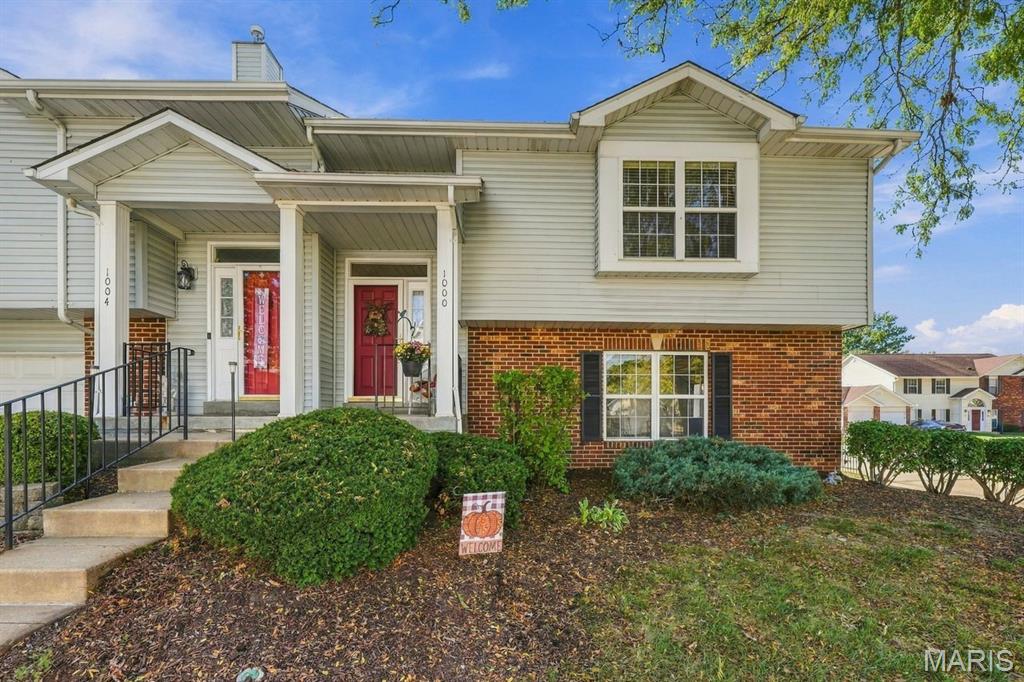 This well-maintained split-level condo offers approx. 1,638sf of living space, featuring 2 spacious bedrooms, 3 full bathrooms, and an attached 2-car garage. A vaulted ceiling, skylit entryway, abundant natural light, ceiling fans, and a W/B fireplace create a warm and inviting atmosphere. The private deck overlooks trees and provides the perfect place to unwind. The finished walk-out lower level adds valuable living space, making it ideal for entertaining, hobbies, or a quiet place to relax. It includes a full bathroom with walk-in shower, a laundry closet with room for full-size washer/dryer units, and ample storage. Sliding glass doors lead to a private patio and adjacent common ground for increased outdoor enjoyment. The roomy garage w/storage is a rare find for condos in this range. Recent updates include a new roof (HOA) and a new A/C unit, for added peace of mind, and both the heater and water heater are only 8 years old. Enjoy low-maintenance living with lawn care and snow removal included. Monthly HOA dues are $235, and residents benefit from responsive association management. BONUS: Seller is offering $5,000 credit at closing for carpet replacement. Nestled in a quiet, well-kept community near Mid Rivers Mall Dr and Mexico Rd, it’s just minutes to shopping, dining, entertainment, services, and major highways. Whether you’re buying your first home or looking to downsize without sacrificing space or convenience, 1000 Kamptown offers exceptional value in a highly desirable location. Schedule a showing today!