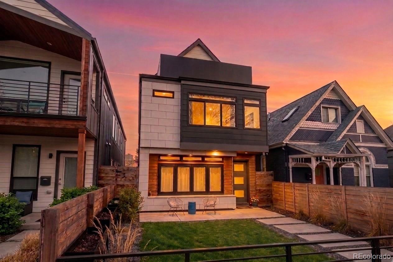 Experience the pinnacle of modern city living in this 2020-built Denver masterpiece, expertly crafted by renowned builder Workshop Denver and ideally positioned in the heart of LoHi. Spanning over 4,000 square feet, this residence seamlessly blends sophisticated design with intentional functionality.The main level is designed for both everyday living and elevated entertaining, featuring an expansive open-concept layout anchored by a true chef’s kitchen. Outfitted with high-end appliances, a professional-grade gas range, and full-column refrigerator and freezer, this space is as refined as it is practical. Upstairs, the second level offers three spacious bedrooms, each with its own private en-suite bath—creating a sense of comfort and privacy throughout. The third-floor loft opens to two expansive rooftop decks, delivering unobstructed panoramic views of the downtown skyline and the Rocky Mountains—an exceptional setting for both hosting and quiet retreat. The fully finished basement adds remarkable versatility with a private two-bedroom, one-bath suite complete with its own full kitchen—ideal for guests, multi-generational living, or flexible income potential. The home has demonstrated strong rental performance, with prior use supporting approximately $3,000/month in income for the basement apartment alone, offering an attractive opportunity for those seeking a blend of lifestyle and investment.Outside, a private backyard oasis features a Wind River Spas hot tub and dedicated entertaining space, offering a rare balance of urban energy and personal retreat.Located just moments from LoHi’s most coveted destinations, enjoy effortless access to the Highland Bridge, Union Station, Coors Field, and neighborhood favorites like Blue Sparrow Coffee, Confluence Park, Root Down, and Linger.Whether hosting on the rooftop, unwinding under the stars, or stepping into Denver’s most vibrant neighborhood, this home delivers a lifestyle that is both elevated and effortless.