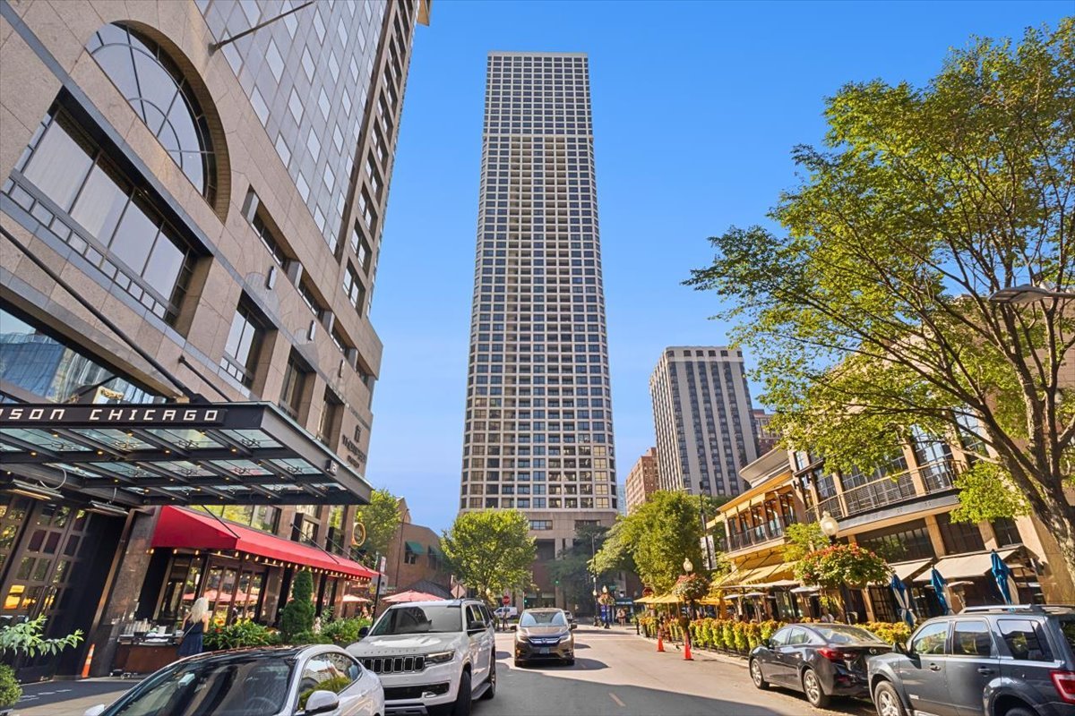 Breathtaking Corner Residence at Newberry Plaza    Wake up to sunrise views over Lake Michigan and enjoy sweeping eastern and southern skyline vistas from every room in this stunning corner home.    The smart split-bedroom layout offers privacy and space for both bedrooms. The primary suite is a true retreat, featuring a walk-in closet, additional reach-in closet, in-unit laundry, and a spa-like bath with a soaking tub, steam shower, and dual vanities. Step directly onto the 25-foot balcony from the primary suite and take in the unobstructed, panoramic views.    The window-lined kitchen overlooks the Gold Coast and lake, filled with natural light and equipped with generous counter space and high-end stainless steel appliances, including a Wolf oven, perfect for any home chef.    The expansive living and dining area is ideal for entertaining, offering corner views to the south and east with balcony access. It's equally stunning during the day or lit up at night. Recent updates include new hardwood floors and an updated kitchen.    Newberry Plaza provides professional management, strong reserves, 24-hour door staff, and amenities including a stunning outdoor pool, courtyard, fitness center, package room, and updated lobby. All of this is just steps from Gibsons, Maple & Ash, Oak Street shopping, the lakefront, and more. Quintessential city living at its finest.