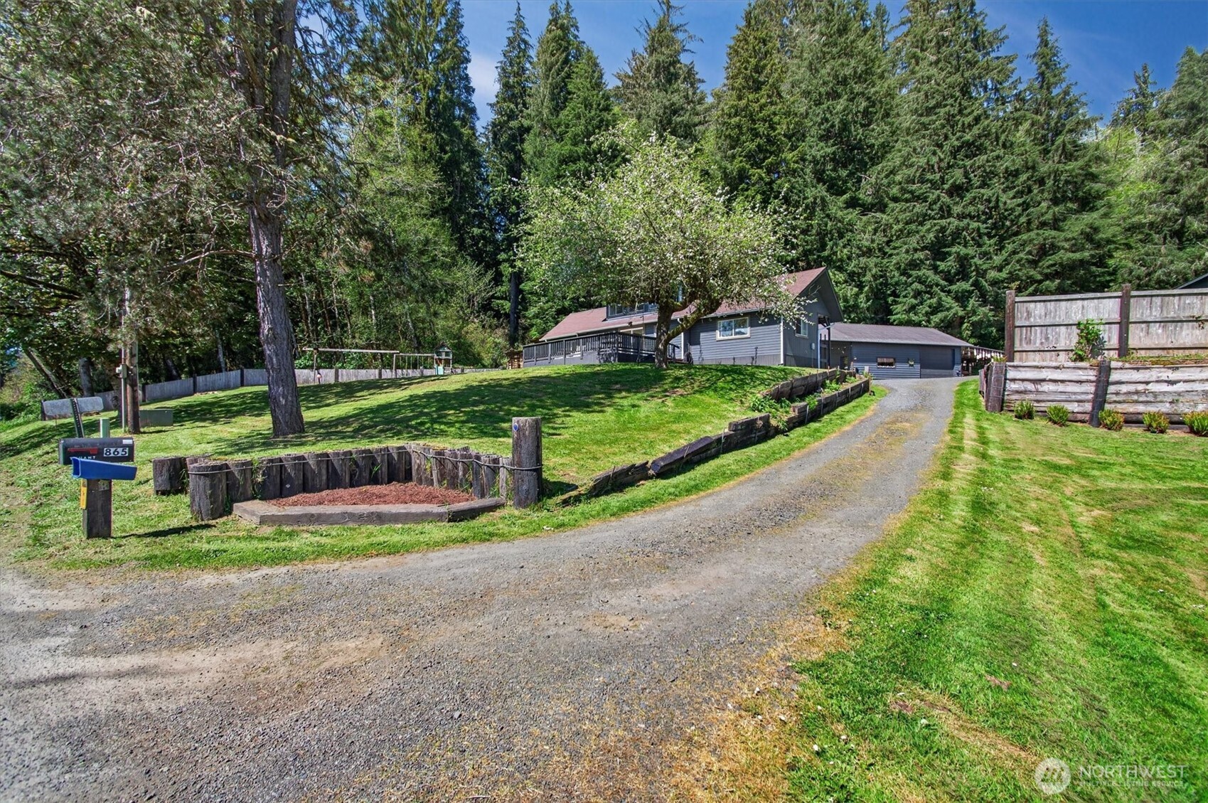 Tucked away in the woods, this serene country compound is a dream for those who love space, nature, and versatility. The park-like grounds invite you to relax around the firepit or explore the neighboring public land right from your doorstep. Sip your morning coffee on the deck while taking in peaceful valley views and watching local wildlife, including eagles, deer, and elk. Inside, enjoy three main-level bedrooms plus a flexible loft space ideal for guests, a home office, or a rec room. The impressive 24x36 three-bay shop and separate workshop with wood stove and covered patio provide endless opportunities for hobbies, storage, or workspace. With 0.8 acres, southern sun exposure for gardening, covered RV parking, woodsheds, and multiple covered parking options, this property is built for both comfort and adventure. Take a 10 minute drive to access the Columbia River for fishing or recreation. Centrally located, you’re just 1.5 hours to Portland and only an hour to the coast—making it easy to enjoy the best of both worlds while coming home to your own peaceful retreat. This is the one!
