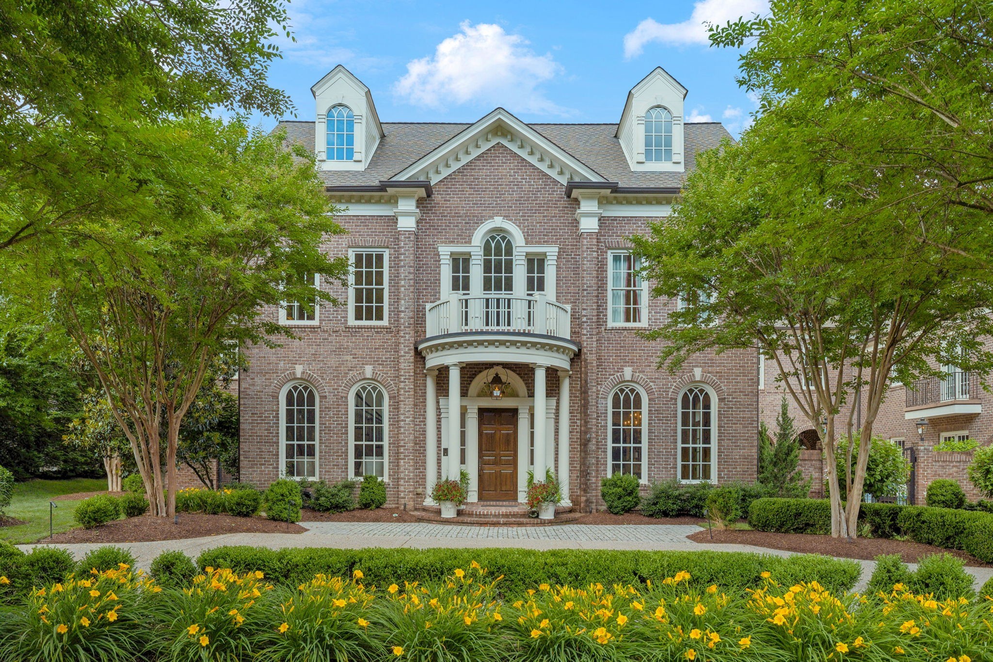 Welcome to luxury living at its finest in the prestigious community of Franklin, Tennessee. Nestled on a pristine lot in the Laurelbrooke subdivision,1616 Whispering Hills Dr stands as a masterpiece of elegance and sophistication, offering unparalleled comfort and style in a spacious 9,735 square foot estate.

Upon entry, the GRAND FOYER,adorned with exquisite chandeliers,a stunning curved staircase and recessed lighting, sets an opulent tone. The main floor boasts an exquisite primary ensuite w/separate tub/shower,separate water closets,dual vanities, and an expansive custom closet.The home's THOUGHTFUL DESIGNS includes five spacious bedrooms,six luxurious bathrooms and two half baths, a separate pool/guest house with a full bathroom, ensuring ample space and privacy for all.

The chef's kitchen is a CULINARY DREAM,equipped with premium SS appliances,Dacor dual ovens,Wolf gas cooktop,Dual Sub Zero refrigerators/freezer drawers, and beautiful marble countertops. A butler's pantry, breakfast nook, and an eat-in kitchen with tons of built-ins offer additional convenience.

Entertain guests in the formal dining room, or unwind in the living room area, with a large screened-in patio, over looking the STUNNING POOL...a setting fit for quiet evenings, family gatherings and summertime fun for all! The residence showcases amazing architectural details, including dual pane and oversized windows with window treatments, illuminating each room with natural light.

Step outside to the private yard, a perfect oasis featuring a detached carriage house-could be an inlaw suite, built-in BBQ/kitchen, covered courtyard with a fireplace/water fountain smart home features-lighting/locks/pool/security. The custom pool by Rondo pools,includes swim out deck w/ loungers, custom evening lighting, hot tub, fire bowls with water features. EX large 3 car garage,1 car carport and extensive guest parking offer convenience. NEW tankless WH and 3 NEW HVAC systems offer additional comfort.