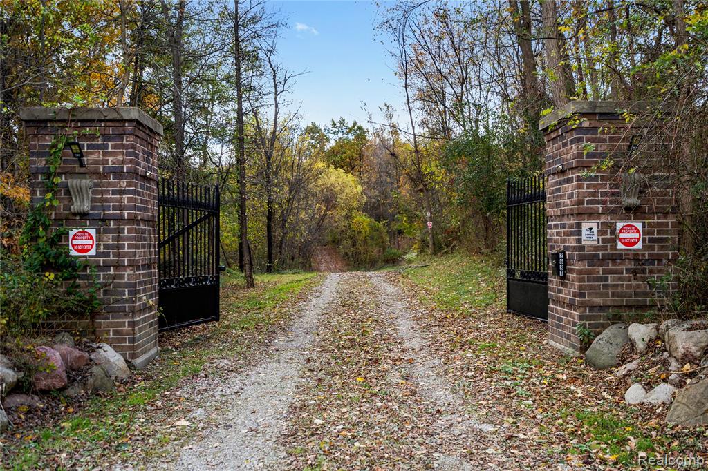 Experience modern luxury and timeless charm in this fully remodeled Cape Cod home, nestled on nearly 7 acres of serene countryside. Behind a private gated entry, this property has been redesigned from top to bottom, featuring all brand-new finishes, fixtures, and mechanicals — truly move-in ready with nothing left to do but enjoy.Located just 10 miles from downtown Rochester and less than 5 miles from downtown Oxford, the home offers the best of both worlds — peace and privacy with easy access to vibrant suburban amenities, restaurants, and entertainment. Inside, the home boasts a bright open floor plan perfect for entertaining, complemented by a spacious covered front porch and a walkout basement that expands your living space. Every room showcases modern craftsmanship and thoughtful design, from the stunning kitchen and bathrooms to the custom trim and flooring throughout. For those who need space and flexibility, the property includes a 40x60 all-metal barn ideal for storage, hobbies, or workshop use, plus a two-story, three-car garage with a separate entrance that could be transformed into a great room, in-law suite, or home office. Additional highlights include a whole-house generator, a charming “she shed,” and room for chickens, goats, cows, and more — perfect for anyone dreaming of space to roam and live freely.If you’ve been searching for a completely renovated home that combines modern living with country tranquility, this property is your dream come true.