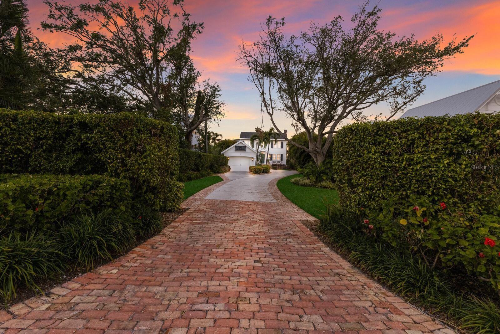 Under contract-accepting backup offers. STUNNING RIVERFRONT POOL HOME FULL OF CHARACTER AND CHARM SITUATED DIRECTLY ON THE MANATEE RIVER!!! Fall in love with this exquisite home, a true gem built in 1916. Set back from the road on a private and serene lot, this four-bedroom, 3 ½-bath residence exudes timeless elegance and has been lovingly maintained to preserve its character. From the moment you arrive, the brick entryway and classic white exterior with black shutters invite you into a home that blends historic charm with modern comfort. Inside, you’ll be greeted by original hardwood floors, intricate wood trim, and authentic glass doorknobs showcasing the craftsmanship of a bygone era. The formal living room offers a cozy wood-burning fireplace and breathtaking views of the Manatee River, creating a perfect spot to relax or entertain. The adjacent sunroom provides a charming retreat with vistas of downtown Bradenton and Palmetto, ideal for morning coffee or evening sunsets. The Chef’s Kitchen is a culinary dream, featuring Viking appliances, a Thermador refrigerator, a gas cooktop, Bosch double ovens, and an wine fridge. With ample cabinet space and a cozy eat-in area, this kitchen is as functional as it is beautiful. A formal dining room with stunning light fixtures and gleaming hardwood floors is perfect for hosting gatherings and making memories. The back family room steals the show with incredible panoramic views of the river, overlooking your salt water heated private pool and hot tub. This space offers plenty of room to entertain and seamlessly connects to the outdoors.  Upstairs, the home features four spacious bedrooms and three bathrooms. The primary suite is stunning with it's high ceiling, picturesque views and it's own private balcony overlooking the river. The master bathroom is beautifully appointed with dual sinks, a soaking tub, and a walk-in shower. For added convenience, the upstairs also includes a laundry room. Your own private dock with boat lift allows you to take full advantage of the waterfront lifestyle. The seawall was also redone in 2023. This home has a rich history, having only had a few owners, and it’s easy to see why once you experience its charm. Don’t miss the opportunity to own this timeless treasure. You’ll fall in love the moment you step inside and see everything this stunning riverfront property has to offer. Direct gulf access with no bridges to the Bay and the Gulf of Mexico. Enjoy easy access to the white sandy beaches of Anna Maria and the cultural and culinary delights of Sarasota and downtown St. Pete. Ride your bike to the Robinson Preserve, a 682 acre nature preserve with trails, kayak launches and scenic lookouts. Riverfront homes like this don't come along often!