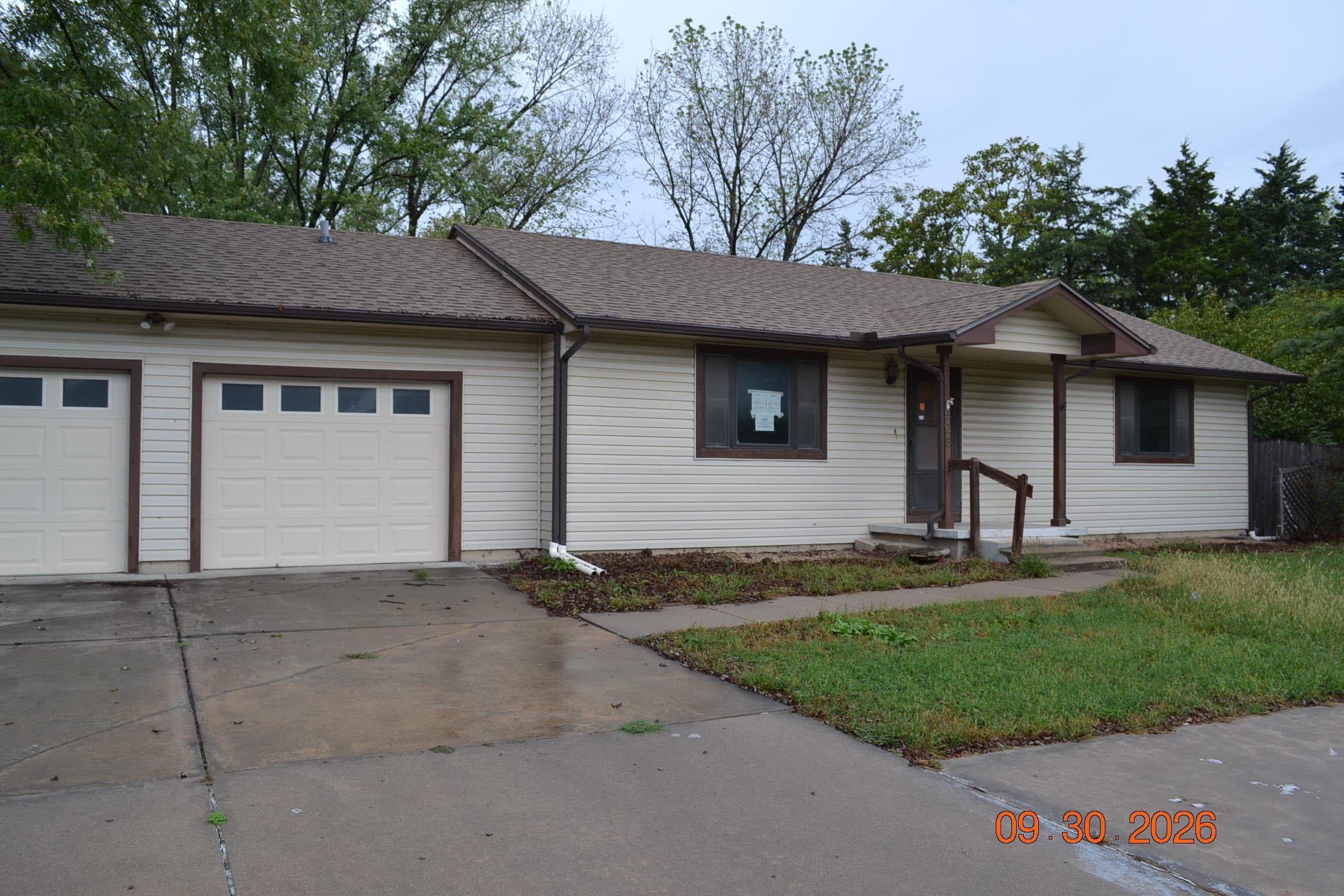 Nice family home in the Andover school district.  Large Family room and bedroom in basement plus a large storage area.  Main floor laundry.  Large yard, privacy fenced back yard has a workshop with a garage door.  Deck on the back side of the house.