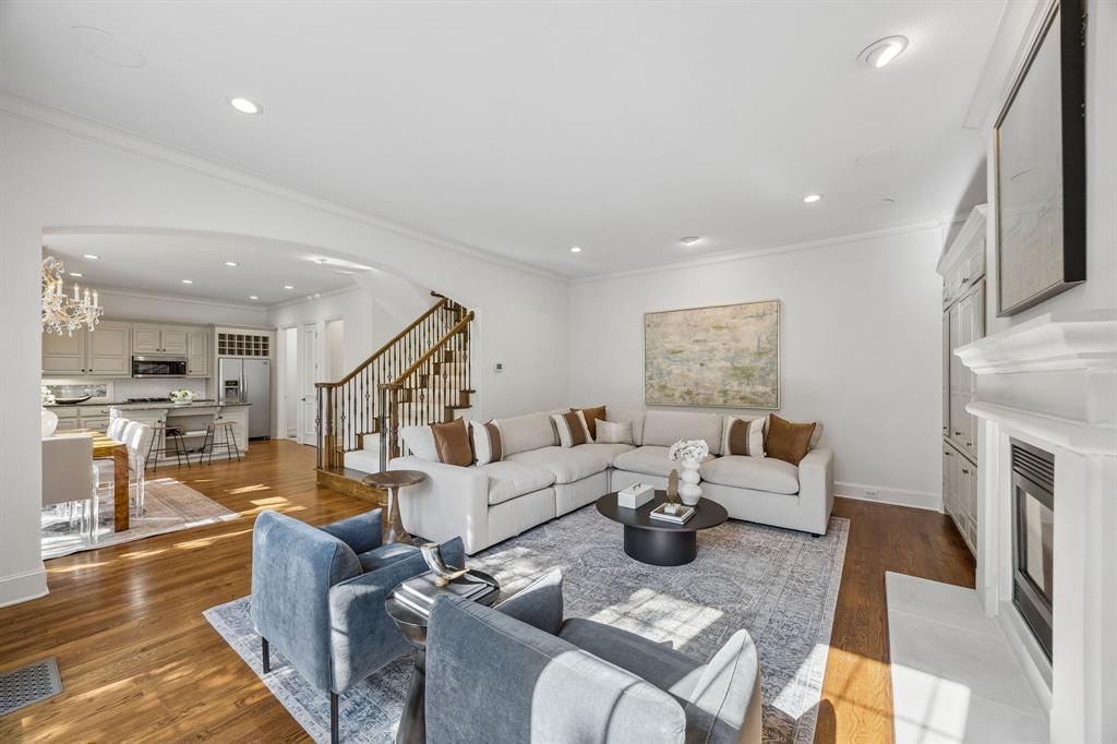 A rare opportunity in coveted Mansion Park, this sophisticated 3-bedroom townhome is one of just 6 residences in a private enclave with NO HOA. Timeless architecture, exceptional natural light & an enviable location in the heart of Dallas put the Katy Trail, Rosewood Mansion on Turtle Creek, dining & shopping all just steps away.  Designed across 3 thoughtfully planned levels, the home offers both privacy & effortless everyday living. On the first floor, a spacious en suite bedroom with a walk-in closet works equally well for guests or a private office. The main level connects the kitchen, dining & living areas in an open, inviting space. Hardwood floors, custom built-ins & floor-to-ceiling windows bring warmth & light, while views framed by a mature elm tree lend a sense of calm in the heart of the city.The 3rd floor is home to 2 additional en suite bedrooms, including a spacious primary retreat with a custom closet & beautifully appointed bath featuring a Restoration Hardware vanity, marble frameless-glass shower & jetted tub. A second bedroom with walk-in closet completes the level.A turfed front yard & private fenced patio make outdoor living easy to enjoy & maintain. An attached two-car garage adds everyday convenience  rarely found in such a walkable setting. Refined, private & exceptionally well located, this Mansion Park residence delivers sophisticated urban living with the best of Dallas just outside your door.