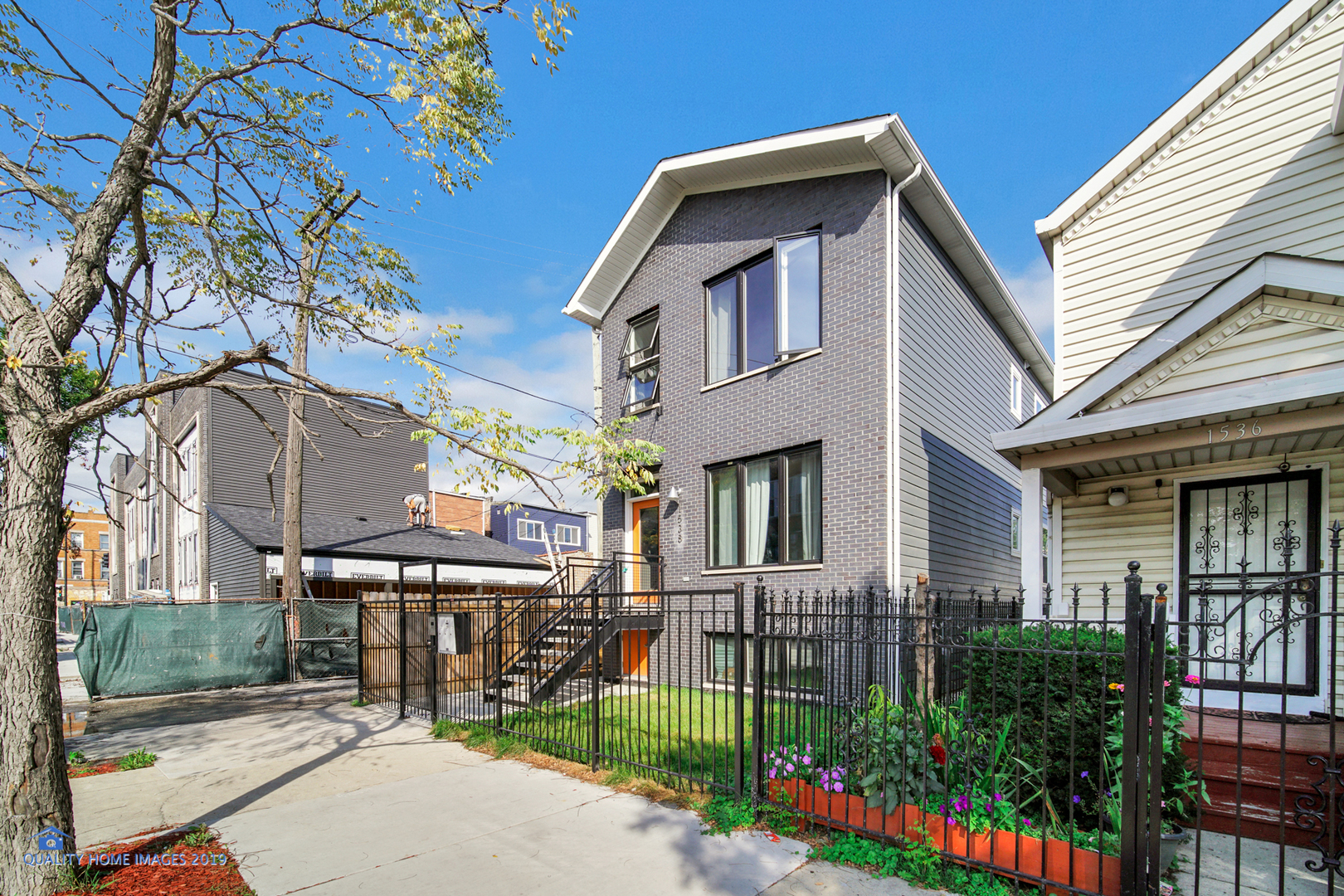 High Quality New Construction3 BED 2 BATH WITH PARKING! (Built 2021) in Excellent PILSEN Location NEAR 18 street/dining/cta/Thalia Hall, Park, Museum, PINK line etc. All the trimmings here: Quartz, Modern European Kitchen Cabinetry, Stainless steel appliances, Extra Storage, Large Master Walk In Shower, Walk in Closet, again...Parking space included! Enjoys exclusive private side entrance use of front yard area(large grass in front assigned to this unit)! Generous room sizes in all 3 bedrooms. Better quality construction than typical from the +PlusHouse Builder: Foam Insulation in walls and Hard Foam Insulation under the Floor. Sound reduction insulation between the units and under and around the stairs and in bath wall. Upgraded trim package is above par with solid doors throughout(full wood window box outs, no cheap bi folds, two step 6" base with shadow line reveal and door-stop modern shoe).  Current taxes are for the building as 3 unit. Taxes will be assessed in future as it breaks as condo in 2025. Arf! Dog friendly and this Pilsen Location across from Park and a few short blocks to the Pink Line and Park. In center of the Mural Walk zone. You have it all here, new construction quality, location, and value. See you at regular open s announce d online each week