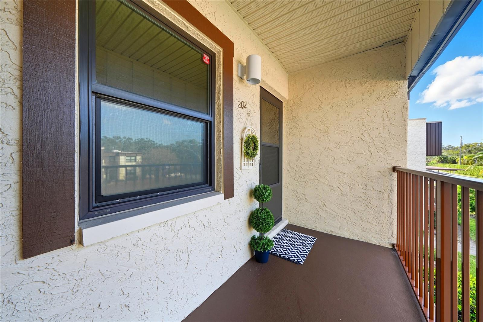 This condo has been extremely maintained and has been meticulously decorated.  Come see this completely furnished move-in condition condo and make it your own.  Welcome to paradise and enjoy living in this 2 bedroom, 2 bathroom condo with updates galore.  Check out the granite counter tops, custom built-in cabinet space with pull out drawers for additional storage.  Both bathrooms have custom cabinets and are updated.  The living room is spacious with a dining area for plenty of room for entertaining for an open and inviting floor plan with beautiful wood-look flooring throughout.  You will also enjoy access to a private heated pool, hot tub, shuffleboard and pickleball or tennis courts.  There is a clubhouse that has kitchen and meeting rooms and rec room to play pool or ping ball.  Conveniently located just 5 miles to Honeymoon Island State Park and world-class beaches, shopping, dining and more.  Don't miss your chance to live the vibrant Florida lifestyle you've always dreamed of.  Schedule your private showing today!
