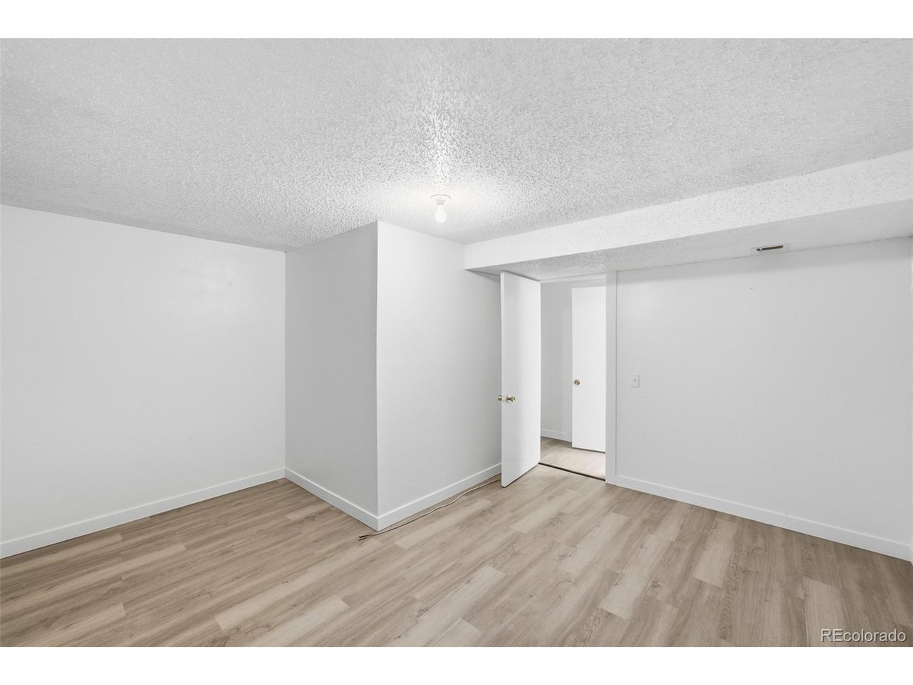 Beautifully remodeled home!! This 4-bedroom, 3 bathroom home features fresh updates throughout, from new flooring and paint to updated kitchen and bathrooms. The main level offers 2 bedrooms and 2 bathrooms, while the basement adds 2 additional bedrooms (non-conforming) plus a third bathroom. Enjoy the convenience of nearby schools, shopping, and easy access to major routes. Move-in ready and waiting for you!