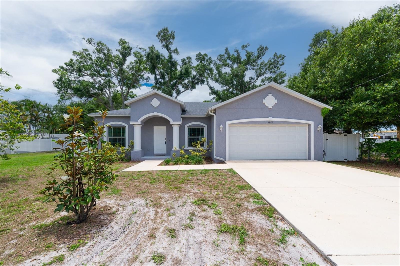 Immaculate 2020-Built Home in Pinellas Park – Solar Included & Paid Off at Closing! Why wait to build when this stunning 2020-built gem is move-in ready and loaded with upgrades? This 3-bedroom, 2-bath split floor plan home with a 2-car garage offers the perfect blend of modern design, energy efficiency, and everyday comfort. Step inside to a bright and airy open-concept layout where natural light pours through double-paned, insulated Energy Star® windows. Soaring 9'4" volume ceilings create an expansive feel, while gorgeous stone countertops and Frigidaire Gallery® Smudge-Proof™ stainless-steel appliances make the kitchen a true showpiece. The spacious master suite is a private retreat, complete with a generous master bath designed for relaxation. The split floor plan ensures privacy for family and guests alike. Energy-conscious buyers will love the solar panels, fully paid off at closing, along with the high-efficiency Energy Star® heat pump, 40-gallon quick recovery water heater, and Scott Eco-Care® low-VOC paints throughout. Custom hurricane shutters provide peace of mind during storm season, while the Timberline Prestige® HD roofline shingles come with a 35-year warranty. Tech-forward features include RG-6 Quad cable data wiring with surge protection and convenient USB ports throughout the home. This is Florida living at its finest! Energy-efficient, hurricane-ready, and beautifully appointed.