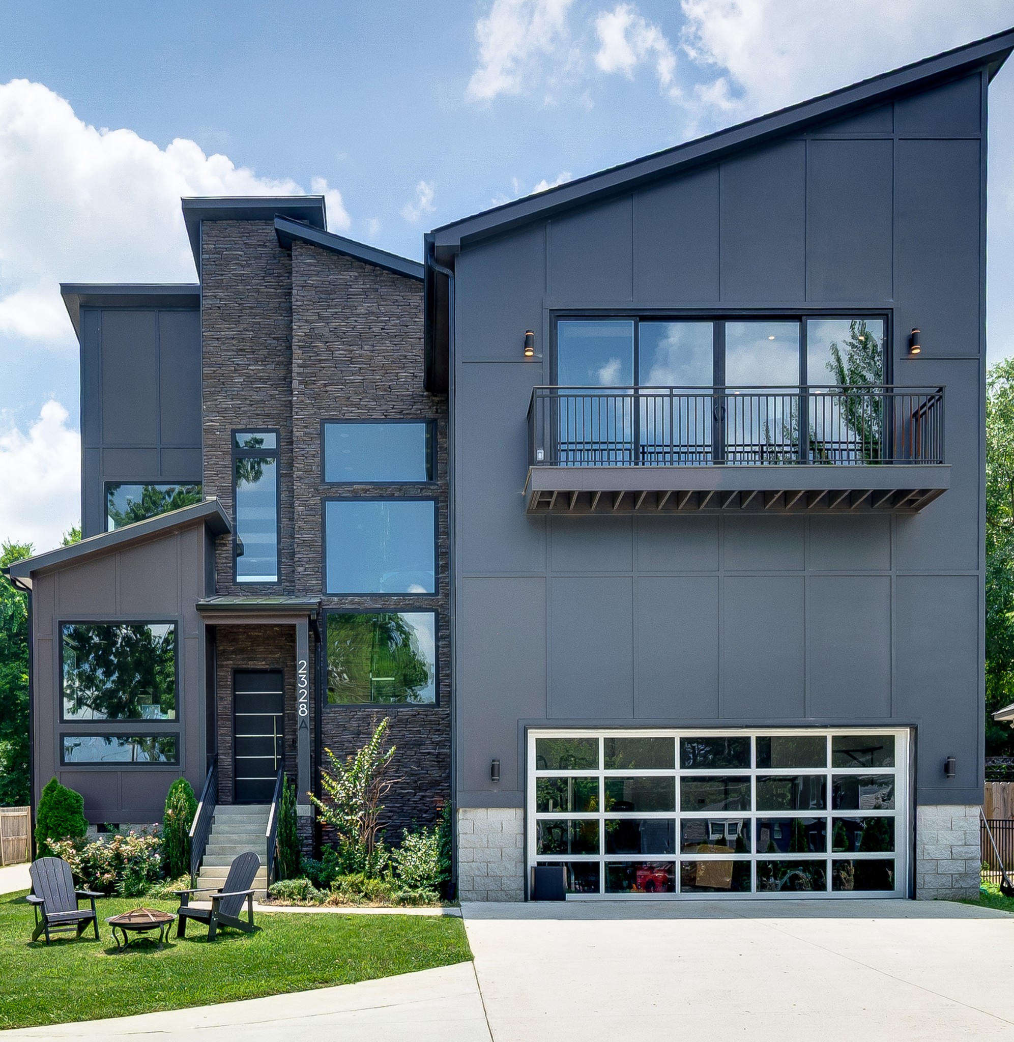 Welcome to 2328 Carter Ave—where thoughtful design and modern luxury come together in one of East Nashville’s most charming neighborhoods. This 3,412 sq ft single-family home offers the perfect blend of style, space, and functionality, making it ideal for everyday living and effortless entertaining.

Step inside to a warm, welcoming foyer that opens to a light-filled, open-concept living space. With four spacious bedrooms and 4.5 beautifully finished bathrooms, there’s room for everyone to relax and recharge. The primary suite feels like a private retreat, featuring a spa-like bath with a separate soaking tub and walk-in shower.

Need a quiet space to work or get creative? The dedicated home office and separate music room offer flexible options to suit your lifestyle. Custom closets throughout the home provide elevated storage that’s both practical and polished.

Out back, you’ll find a private yard with smart lighting—perfect for evening hangouts or winding down after a long day. Plus, there’s plenty of outdoor storage for tools, toys, or seasonal gear.

Every detail in this home was designed to make life easier, more beautiful, and more enjoyable. If you’re looking for a fresh start in East Nashville, this home is a must-see. Reach out to schedule your private tour—we’d love to show you around.