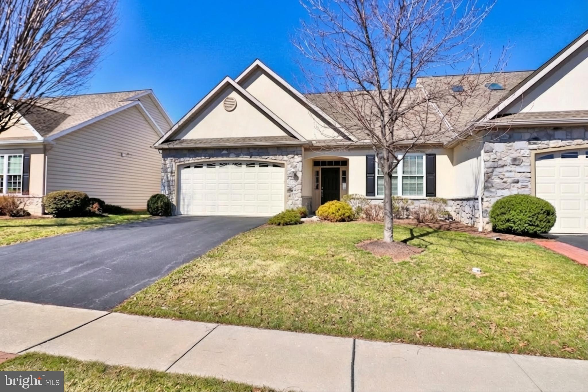 Welcome to the Summit Pointe at Elm Tree community, where easy living is the priority. This 2014  Parade of Homes model, offers a well-designed 3-bedroom ranch layout with an open floor plan. The community’s HOA takes care of exterior maintenance, including roof and grounds, so you can focus on enjoying your home.Inside, the custom kitchen stands out with granite countertops, a tile backsplash, stainless steel appliances, and a sun tube that brightens the space with natural light. The main living areas have 9-foot ceilings, with a decorative tray ceiling in the living room and a vaulted ceiling in the sunroom. Crown moldings, accent walls and archways add a subtle, elegant touch throughout the house. See list of builder upgrades in documents. The finished bonus basement includes a full bathroom and ample storage, with poured concrete walls. Comfort is enhanced with gas heating, central air, and a central vacuum system. A 2-car garage provides convenient parking and storage. Built by Dombach Builders, this home reflects quality craftsmanship.Located close to town, you’ll find shopping and dining options nearby. Quick access to Route 283 makes trips to Lancaster, Hershey, and Harrisburg easy. This home offers a blend of comfort, style, and convenience in a well-maintained community.Experience this home with just a click. Tap the camera icon to browse high-resolution photos and launch the full 360° virtual tour. For a truly immersive VR adventure, slip on your headset and follow the Kuula link to explore the spherical walkthrough. Prefer a guided video? Search the property address on YouTube to watch our home tour.