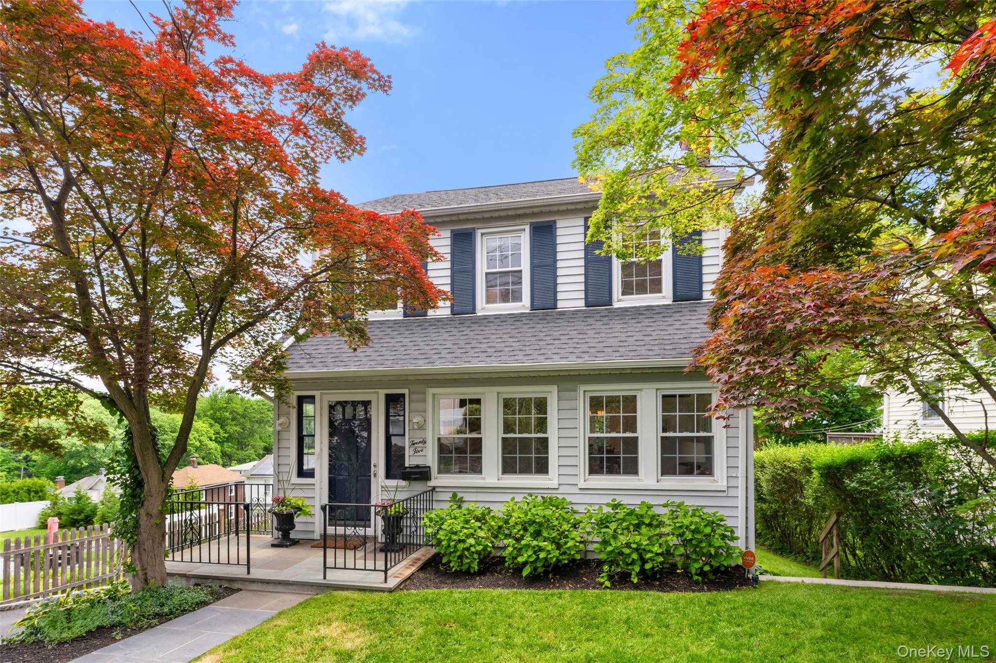 Welcome to 25 Pinebrook Road, a beautifully renovated Colonial offering the perfect combination of timeless character, modern upgrades, and everyday convenience. Thoughtfully renovated in 2021, this bright and sunny 3-bedroom, 2-bath home has been updated with comfort, style, and functionality in mind.The main level features wonderful natural light, warm hardwood floors and an inviting layout ideal for both daily living and entertaining. The chef’s kitchen is the heart of the home, complete with high-end stainless steel appliances, tons of storage, a large center island, and plenty of space to gather, cook, and connect. A charming sunroom adds flexible additional living space, perfect for morning coffee, reading, play, or a quiet place to unwind. With three well-proportioned bedrooms, two updated baths, and a dedicated office space, the home offers excellent flexibility for today’s lifestyle. Whether you need a work-from-home space, guest room, or creative studio, the floor plan easily adapts to your needs. The lower level is a special bonus, featuring high ceilings and an original bar that adds character and great potential for entertaining, recreation, a home gym, music room or additional lounge space. Outside, enjoy a lovely patio for outdoor dining, relaxing, and hosting friends and family. Recent upgrades include updated windows, a new roof, new AC units, patio, driveway, hardwood floors, and many improvements throughout — truly too many to list. Additional highlights include ample driveway parking and a two-car garage, a rare and valuable convenience. Ideally located less than a mile from the Larchmont train station and close to Beechmont Lake and Flowers Park, this home offers easy access to commuting, outdoor recreation, shopping, dining, and all that New Rochelle and nearby Larchmont have to offer.
