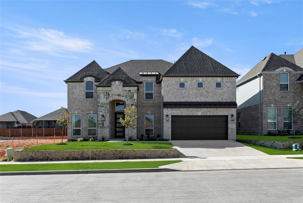 MLS# 20660720 - Built by First Texas Homes - Ready Now! ~ Boasting great curb appeal with herringbone patterned brick detail, stone arch , and metal roof awning at garage. An inviting entrance with soaring ceilings, curved staircase, open kitchen concept, and sliding glass doors to patio. Optional shower at powder bath makes first floor study usable for a guest room as well. A family fun design with a large game room, home theater, and large covered patio. Many upgraded features planned for this new home!