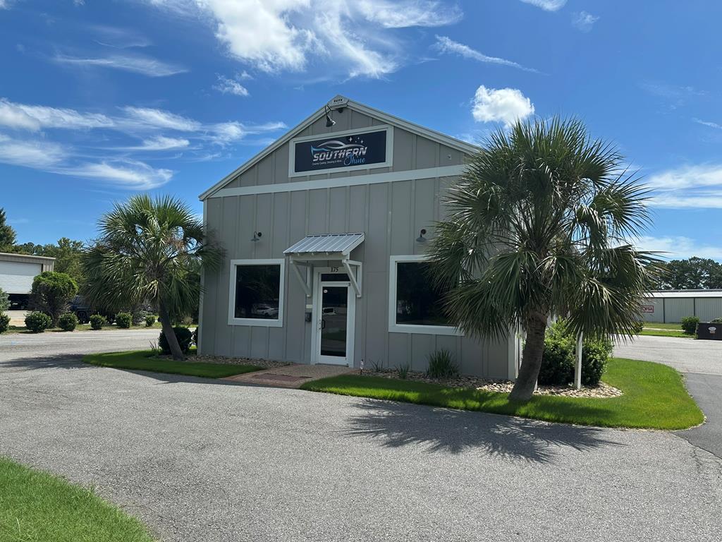 Multi-purpose building in excellent shape with high ceiling and many potential uses.  Previously used as a car wash.  Private Office, and Waiting Area.  Sales Counter has been removed as shown in photos.  Mini Split Air Conditioners.  Extra Storage on top of the office area.   Excellent parking. Drive-through building.  Wash Out Bay. Property could be modified to be an enclosed structure for warehousing or for some other types of manufacturing uses.   Check out City of Thomasville Permitted Use Table and look at all the uses allowed under M zoning.  This is an attractive building.  Security System and Video equipment included in the sale.  Convenient and accessible location.  Three Open Bay Areas(24' x 30', 25' x 30', 22' x 30' (+/-)  15' Clearance coming in... additional space underneath.  10 parking Spaces.  Wrap-around drive.  City Taxes to be determined.  Office heat and cooled sq ft is approximate.