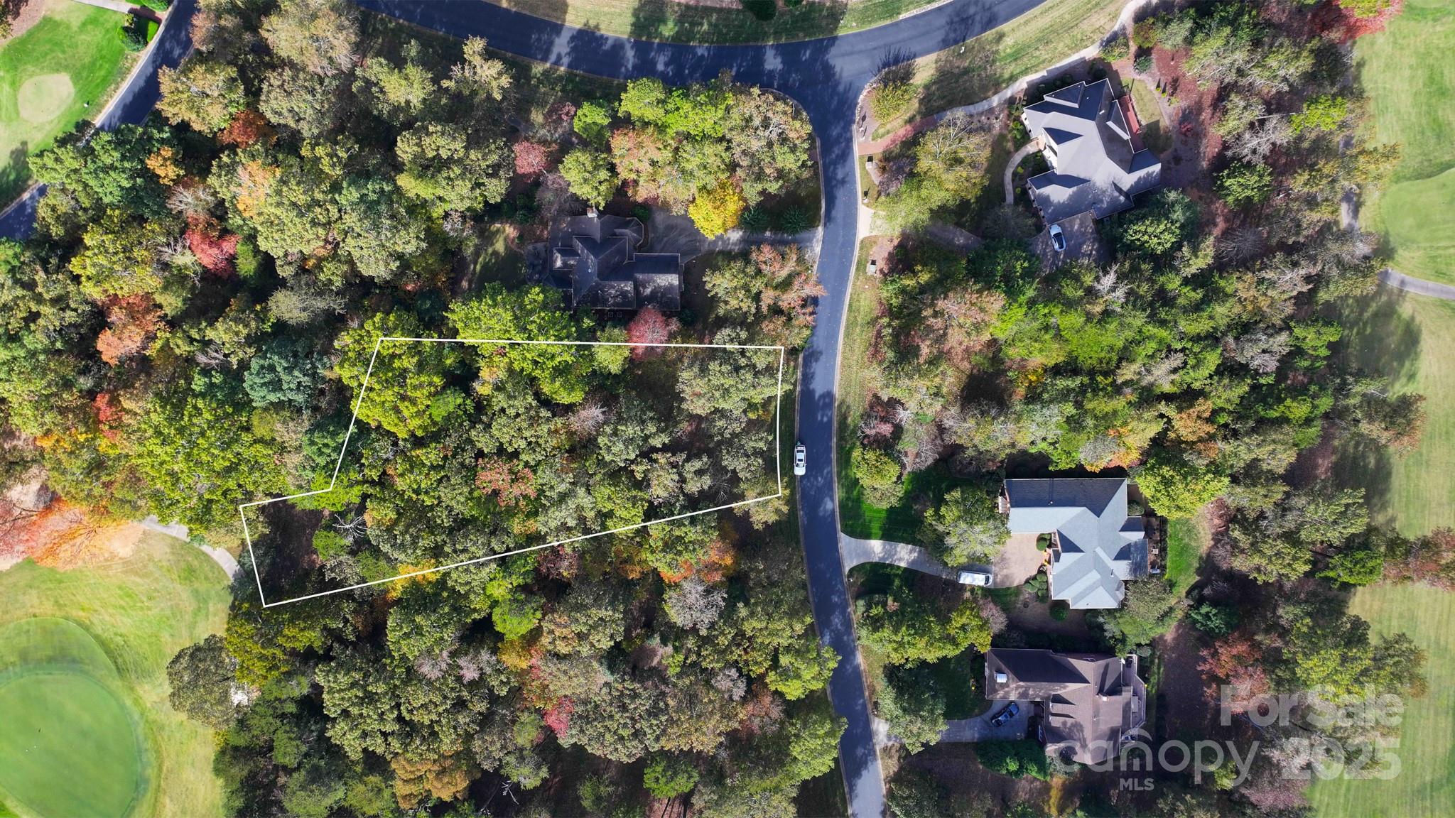 Located on the par 4 12th hole at the Old North State Club golf course in the Uwharrie Point community. This is a beautiful, wooded lot with .66 acres. This is a championship golf course and memberships are available with swimming, tennis, fitness, fine dining and a full service marina as the amenities. Uwharrie Point is a gated community located on Badin Lake and is a wonderful place for boating and water sports.