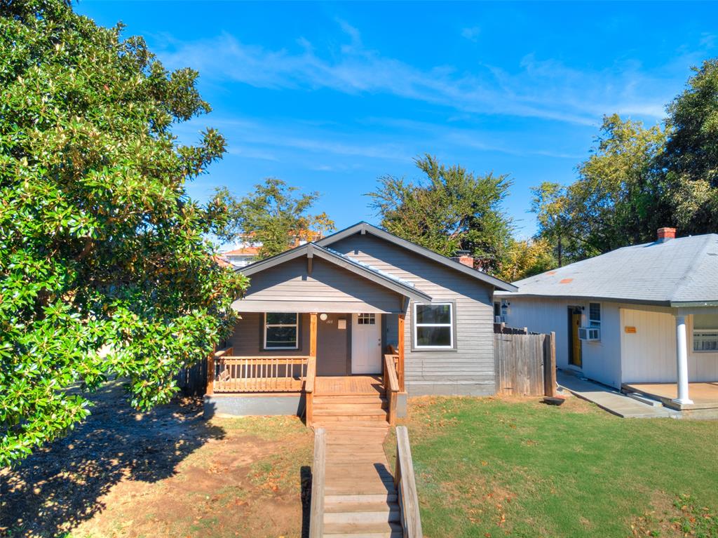 Urban charm meets modern style! This 2-bedroom, 2-bath home is bursting with fresh updates — including crisp new paint, luxury vinyl plank flooring, sleek quartz countertops, stylish tile, and modern lighting throughout. The open floor plan keeps the vibe bright and inviting, perfect for entertaining or relaxing in your own downtown retreat.

Enjoy front porch views of the city skyline and an unbeatable location near the Plaza, Midtown, and Downtown districts — where dining, nightlife, and culture are all just minutes away! With alley access offering potential for rear parking, this one’s got both style and convenience wrapped into one.

Move-in ready, modern, and full of energy — come see why this home is the perfect mix of city life and cozy comfort!