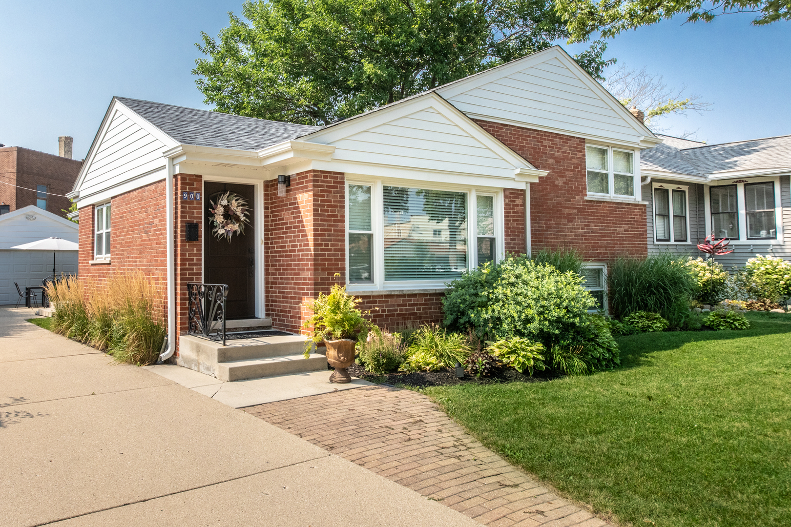 Move-in Ready Gem in Prime Park Ridge Location!  Just a short block from the Dee Road Metra station, this fully remodeled all-brick bi-level home combines style, comfort, and convenience. Step into a stunning modern kitchen featuring sleek European flat-panel, frameless cabinets, quartz countertops, and top-of-the-line Frigidaire Professional Series stainless steel appliances.  The interior has been thoughtfully updated throughout, with all new engineered hardwood flooring on the main and upper levels, modern wood trim, baseboards, and new doors. Extensive recessed lighting floods the home with brightness and warmth.  Both bathrooms have been impeccably renovated with premium finishes and attention to detail. The spacious lower-level family room offers new drywall, lighting, and plush carpeting-perfect for relaxing or entertaining.  Additional highlights include a ceramic-tiled laundry room with newer Maytag washer and dryer, updated 100-amp electrical panel, furnace (approx. 4 years), central air (approx. 8 years), new roof 2022, newer sump pump, and a freshly tuckpointed chimney.  Enjoy outdoor living in the private backyard with a brick paver patio-ideal for summer gatherings. This is truly a turn-key move in ready opportunity.